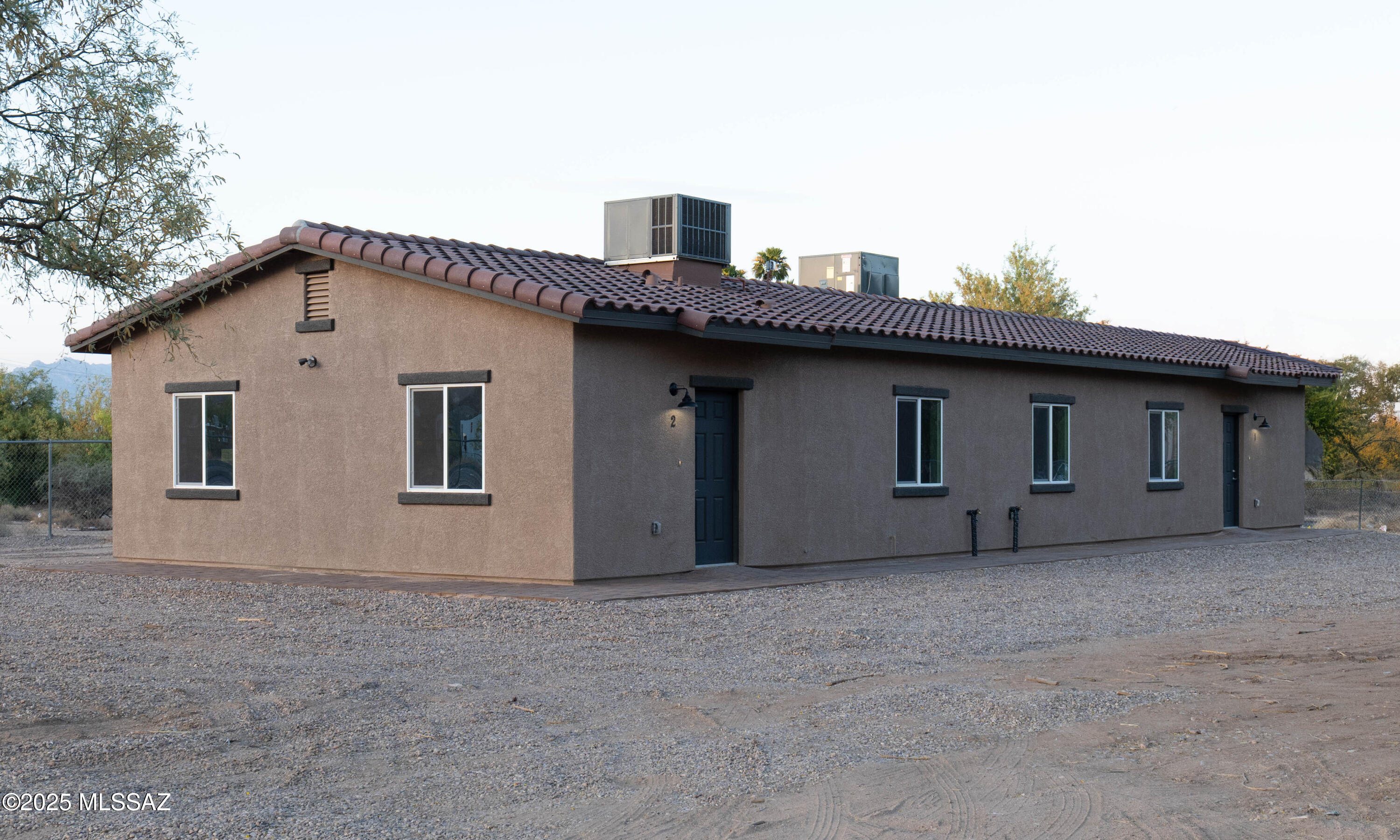 INCOME GENERATING PROPERTY *  *. *.  *   *New Construction DUPLEX . One unit 3 bedroom 2 bath - 1079 sq feet -parking space 2. 2nd Unit 2 bedroom 1 bath - 803 sq feet -parking space 2. Great Investment opportunity Or live in one and rent the other! Beautiful Granite counters through out home, new stainless steel appliances, tile in all areas. Close to I-19 for easy commuting as well as shopping around the corner. Listing Agent related to Seller