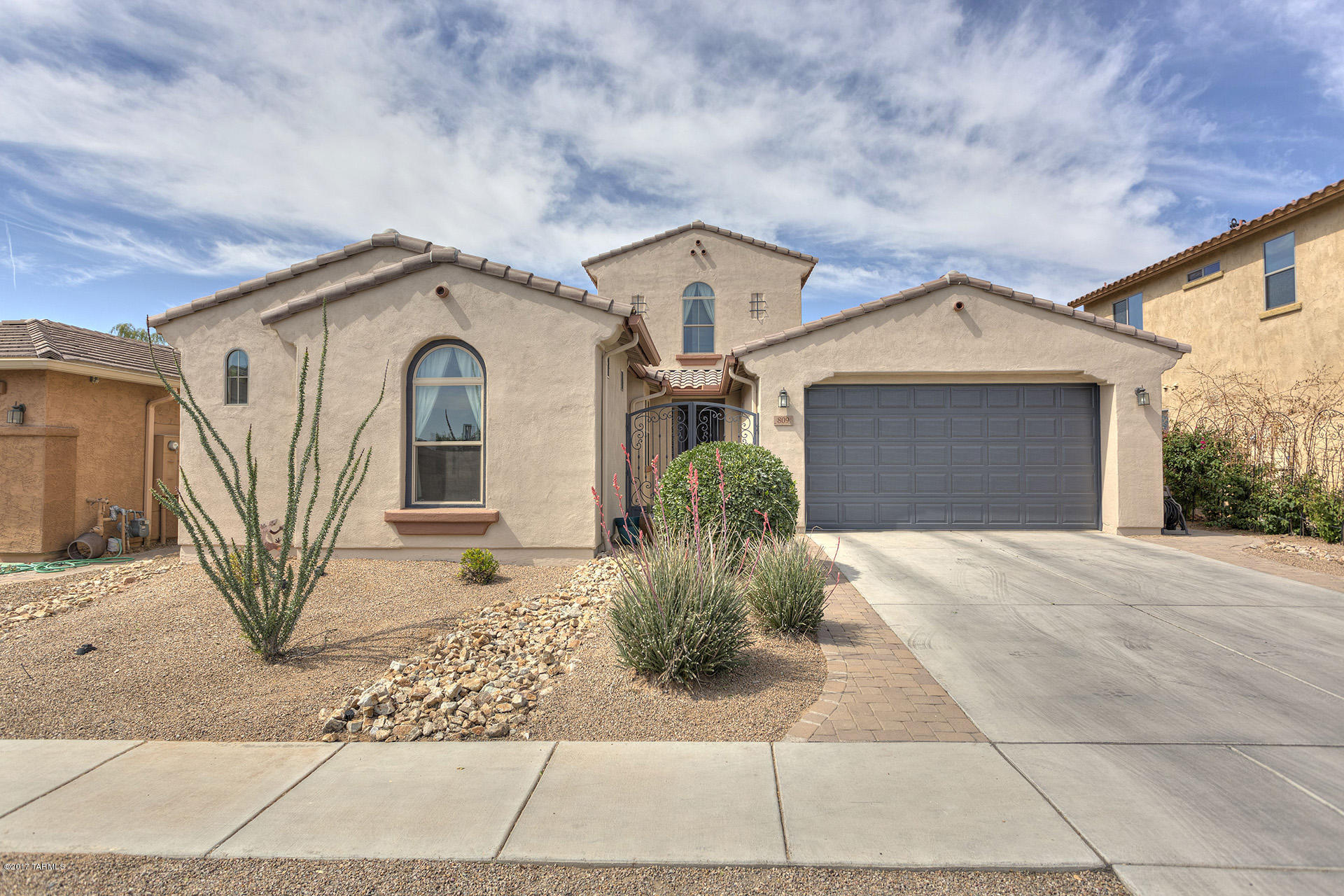 Homes of this caliber do not come on the market often!!This exceptional Maracay home is loaded w/upgrades&is situated in the desirable gated community of Entrada Bonita.Features include a huge newly remodeled gourmet kitchen w/granite counters,custom tile backsplash,massive island,double ovens, pull-outs in all cabinets&walk-in pantry;Master suite w/door to enclosed patio, tiled shower, walk-in closet w/custom built in wood storage system that is a must-see!Upgraded tile,window coverings,ceiling fans in every room,water softener,spacious bedrooms.Upstairs loft leads to a bedroom & full bathroom.Enclosed, tiled covered patio&large,professionally landscaped yard w/firepit&NO REAR NEIGHBORS!Front courtyard;garage w/epoxy floors,storage cabinets. Impressive top-notch home that's move-in ready!