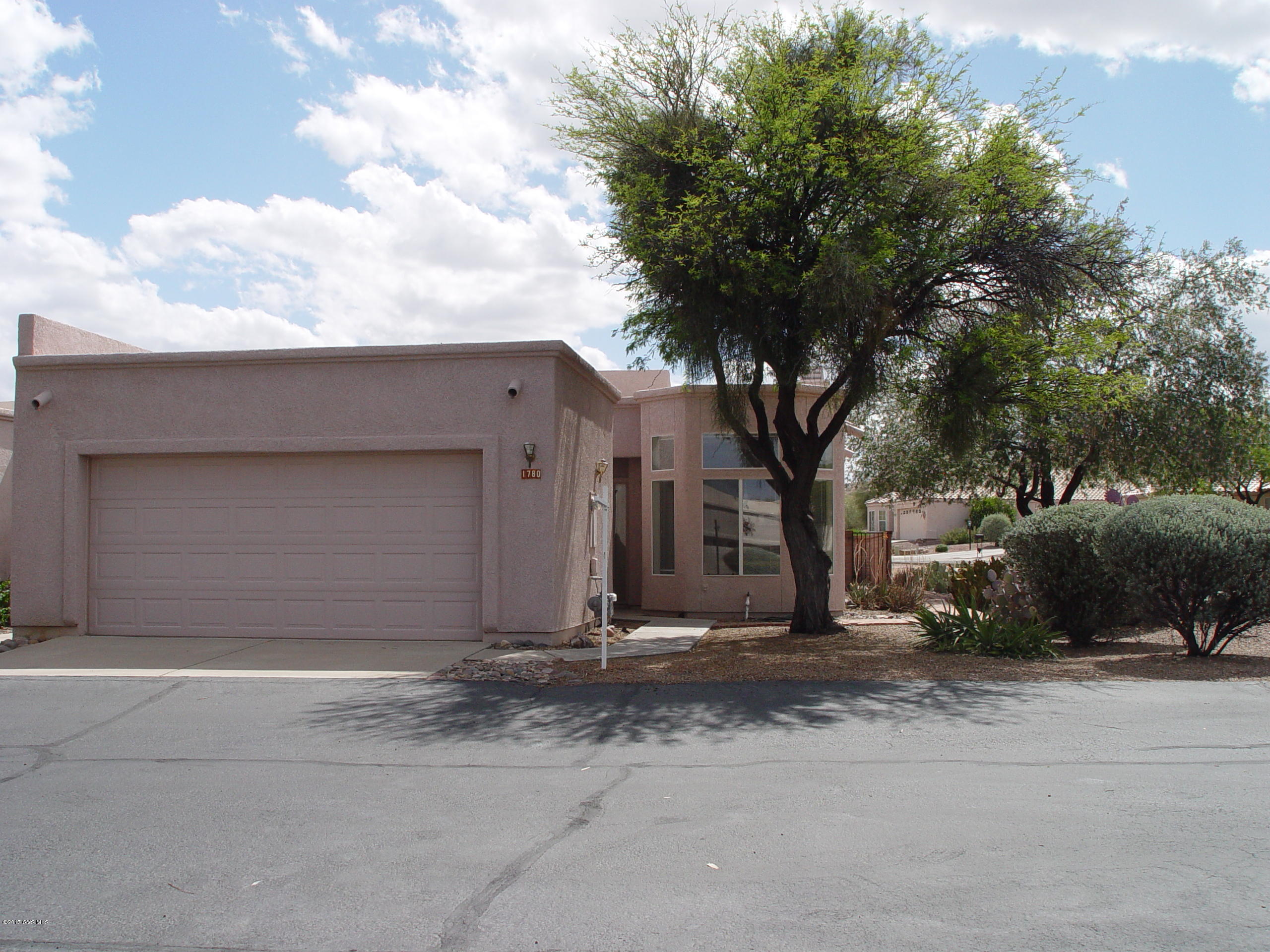 This custom Dorn-built townhome in SpringPointe has a great floor plan sure to please. It has tall ceilings and clerestory windows that set Dorn's homes apart from the crowd. This 1615 sf home is spacious and light-filled making its appeal high. This home has not been lived in for awhile and certainly needs some TLC, but adding that will net you a great, contemporary home on a large corner lot. The home is sold by an estate and it is offering a $4000 credit to replace the HVAC to sweeten the deal if a buyer is interested. Termites just treated & a new roof so the house is ready for new owners with a vision to transform this diamond in the rough into a real jewel. Although there is real potential, this house is offered ''as is'' and no repairs will be made.
