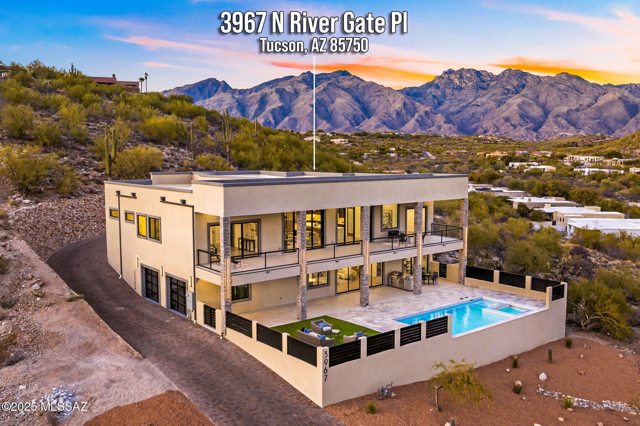 Stunning Modern Estate with Unparalleled Luxury and Breathtaking Views welcome you to this exceptional 6-bedroom, 7.5-bath custom estate, offering top of the line features and and pure luxury. Nestled in an exclusive, gated community, this home seamlessly combines modern design, premium finishes, and cutting-edge technology to create an unparalleled living experience.
Key Features: Expansive Living Space: 5983 sq. ft of living space, including an attached 618 sq. ft. ADU guest suite with a kitchen, laundry room, full bathroom, garage, covered patio and access to the pool. Sophisticated Interior: Engineered oak flooring throughout, custom 8' solid doors, and marble used in all bathrooms. Custom Features: A stunning 72'' glass pivot main door with video doorbell, and a custom paver driveway that welcomes you home. Panoramic Views: Stacking oversized doors open to reveal panoramic city, mountain, and territorial views from almost every room. Gourmet Kitchen: A massive kitchen featuring a 16' waterfall island that seats up to 8, 72" built-in Thermador fridge/freezer, 60" Thermador dual-fuel range with griddle and steam oven, custom cabinetry, under-cabinet and floor lighting, and a large pantry with full cabinetry and countertops.
Luxury Living: Main level primary suite with freestanding tub, oversized shower, double vanities and a large custom closet. All bathrooms feature oversized lighted, fog-free mirrors, and electronic heated bidet toilets.
Entertainment Ready: State-of-the-art theater room with surround sound, 100" TV, and full-length patios on both levels for additional 2,000 sq ft of outdoor living.
Outdoor Oasis: Fully landscaped yard with a heated, self-cleaning, and fully automated pool and spa. Prepped for outdoor cooking with solid wood tongue and groove ceilings on both patios, automated irrigation, and custom stone landscaping surrounding the driveway.
Smart and Efficient Home: Prewired for security, connectivity, and sound, with room for future expansion. High-efficiency Rheem HVAC units, spray foam insulation, and a whole-home water filtration system for comfort and sustainability.
Additional Amenities: Two double car extended garages with glass doors, EV charging circuits, built-in speakers in living areas and patios, and a full ADU on the lower level with a kitchen and laundry.
Convenient Location: Ideally located near Whole Foods, BASIS schools, Hospitals, hiking, golf, bike loop, upscale restaurants and shopping.  Low HOA fees in the gated community.
This home is truly a one-of-a-kind masterpiece, offering the perfect balance of luxury, comfort, and modern convenience. Contact us today to schedule a private tour and experience the elegance and sophistication for yourself.