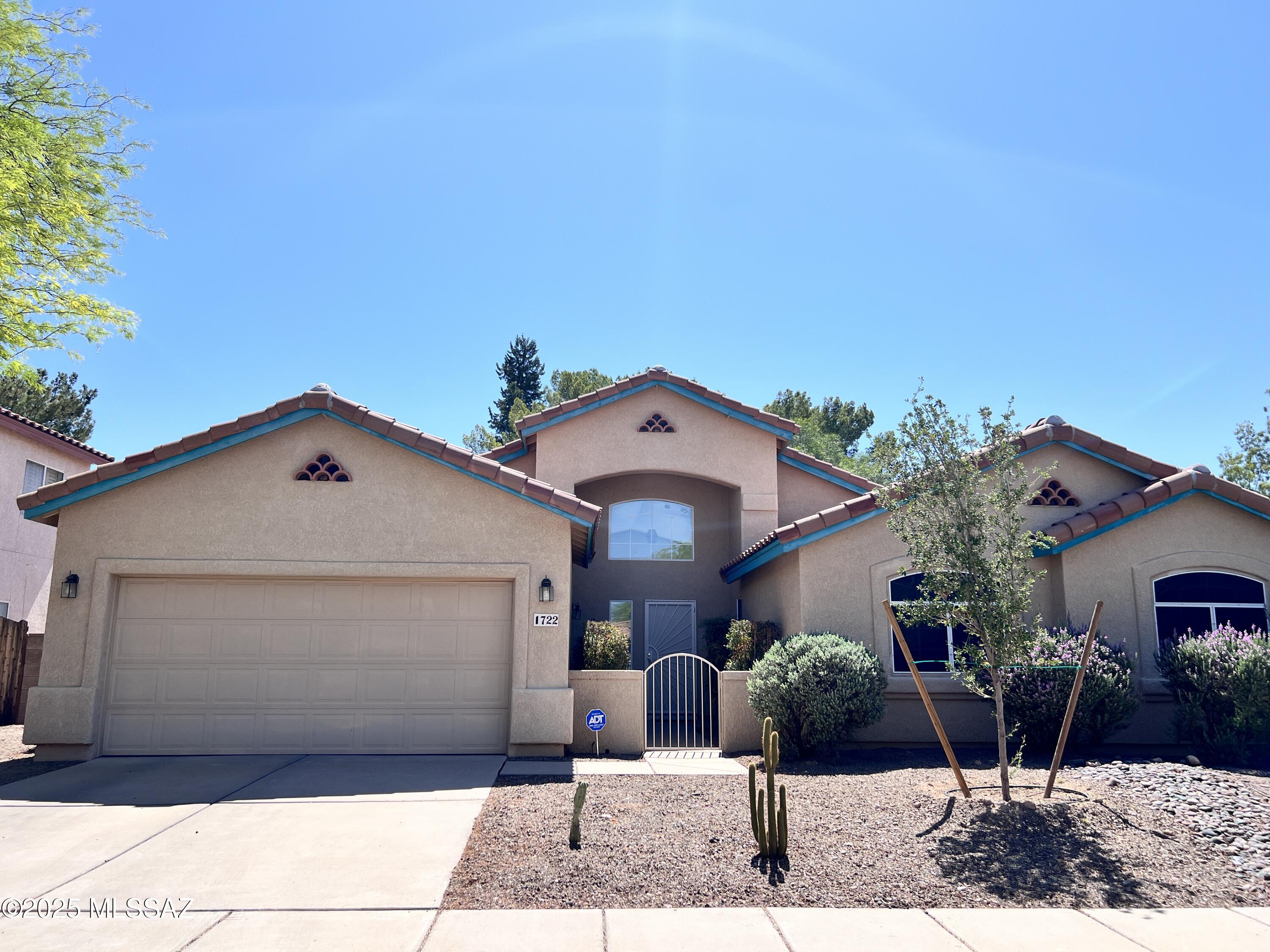 Spacious 3bdr/2ba home in Northeast Tucson!
Gated courtyard entrance w/SW security door, open/bright Living room/Dining room, Family room w/gas fireplace, casual dining area, kitchen features Quartz counters and lots of cabinets space.
Primary bedroom w/ensuite offers dual vanities, garden tub and walk-in shower.
Attached bonus room to primary bedroom offers many uses.
Great backyard w/extended covered patio features artificial turf, pavers and mature trees.
Two car garage, ceiling fans, vaulted ceilings, laundry room w/W/D.