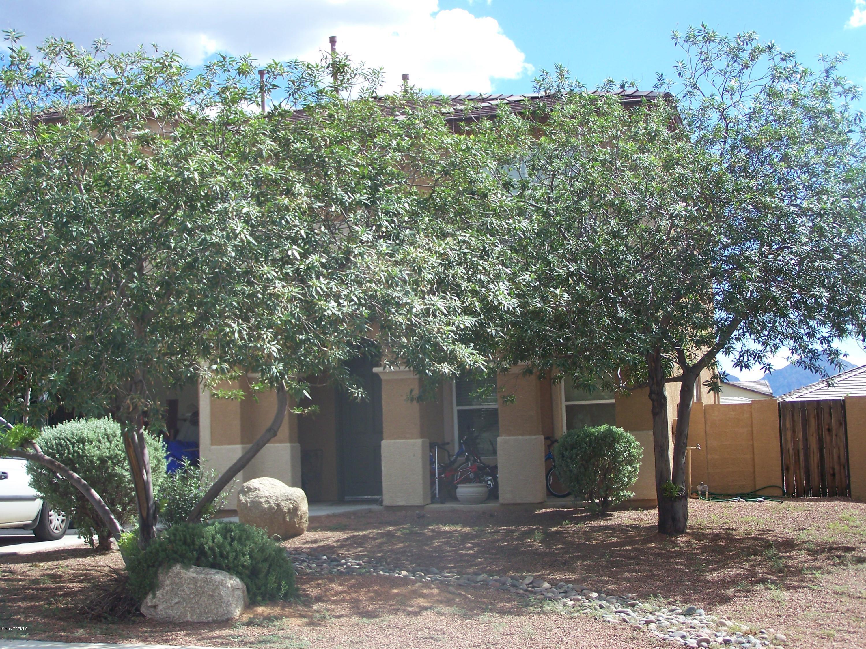 Awesome 4 bedroom 3 bath home, this home offers very spacious rooms throughout, neutral colors, lots of upgrades, covered patio with mountain views. Close to restaurants, shopping and schools. This is must see home. Home will be clean and ready 3/1/2017. Call today 520-544-7429