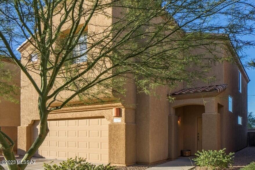 VERY conveniently located (River/La Cholla) 2009 built, 2-story home in desirable Riverside Crossing neighborhood. 1742SF, 3 Beds (Split) PLUS Loft, 2.5 baths, 2C Garage and Community POOL! Neutral 18'' tile on main floor, carpeted upstairs. Granite countertops in kitchen plus island/breakfast bar, GAS range & Stainless appliances. Master bedroom w/huge walk-in closet. Master bath has dual sinks and oversized shower. Two additional bedrooms, handy laundry, and multi-purpose loft area complete the upstairs. Prof landscaped rear living space with pergola. NO homes behind! CLOSE to shopping, dining, schools, parks, river path, medical. LESS THAN 10 mins to Fwy, 20 mins to downtown, 25 mins to U of A, and only 30 mins to airport! Make YOUR move!