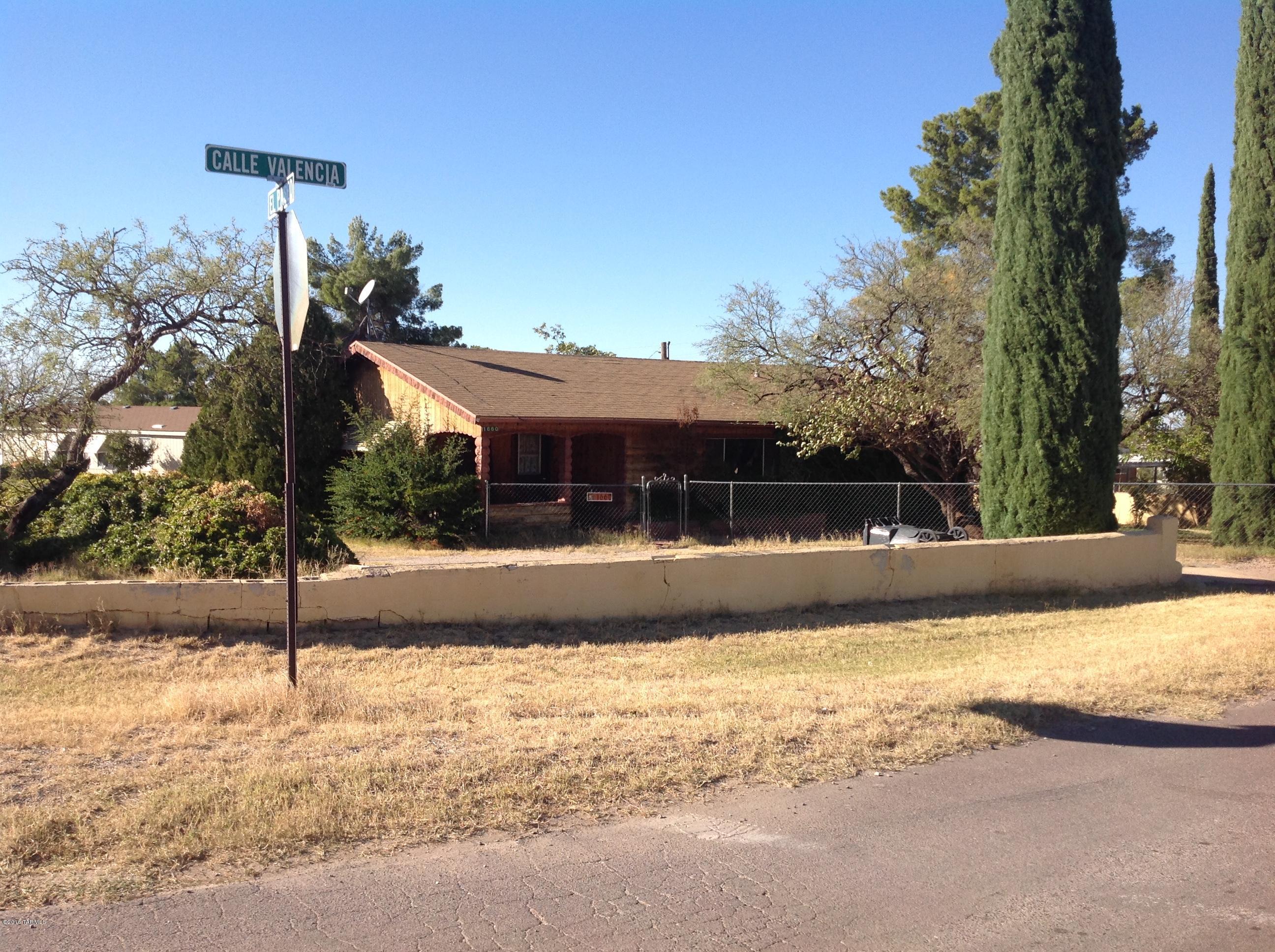 Charming home in need of some TLC on .62 acres.  Home is on .36 acres and .26 acre lot next door is included (parcel #308-36-013). Beautiful yard full of vegetation including fruit trees and a pecan tree.  Large shed on side yard.  This home is sold AS IS.  No appliances included. Within walking distance to Mt. Vista school.