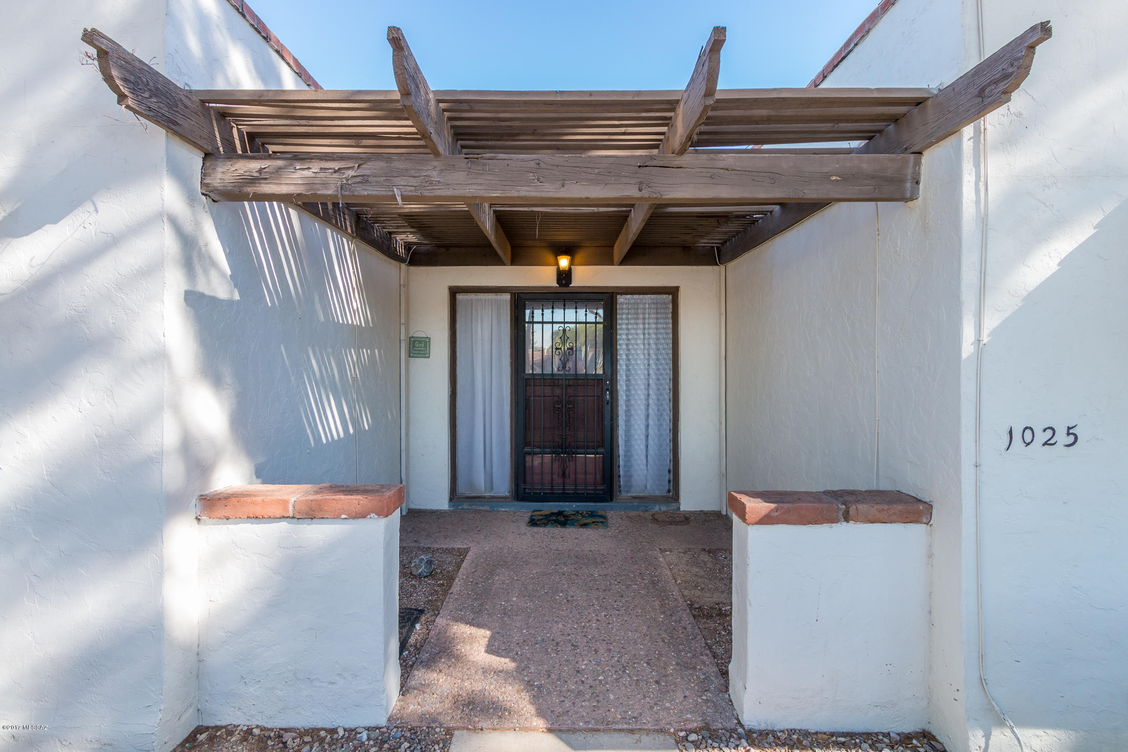Adorable unit in a small Eastside townhome community! Super low-maintenance home, with wood laminate flooring in the living room and a private covered patio off the back of the house. The master bedroom includes an attached bath and its own access to the back patio. Amenities include a community pool and mature trees and landscaping throughout the neighborhood. Absolutely charming home!