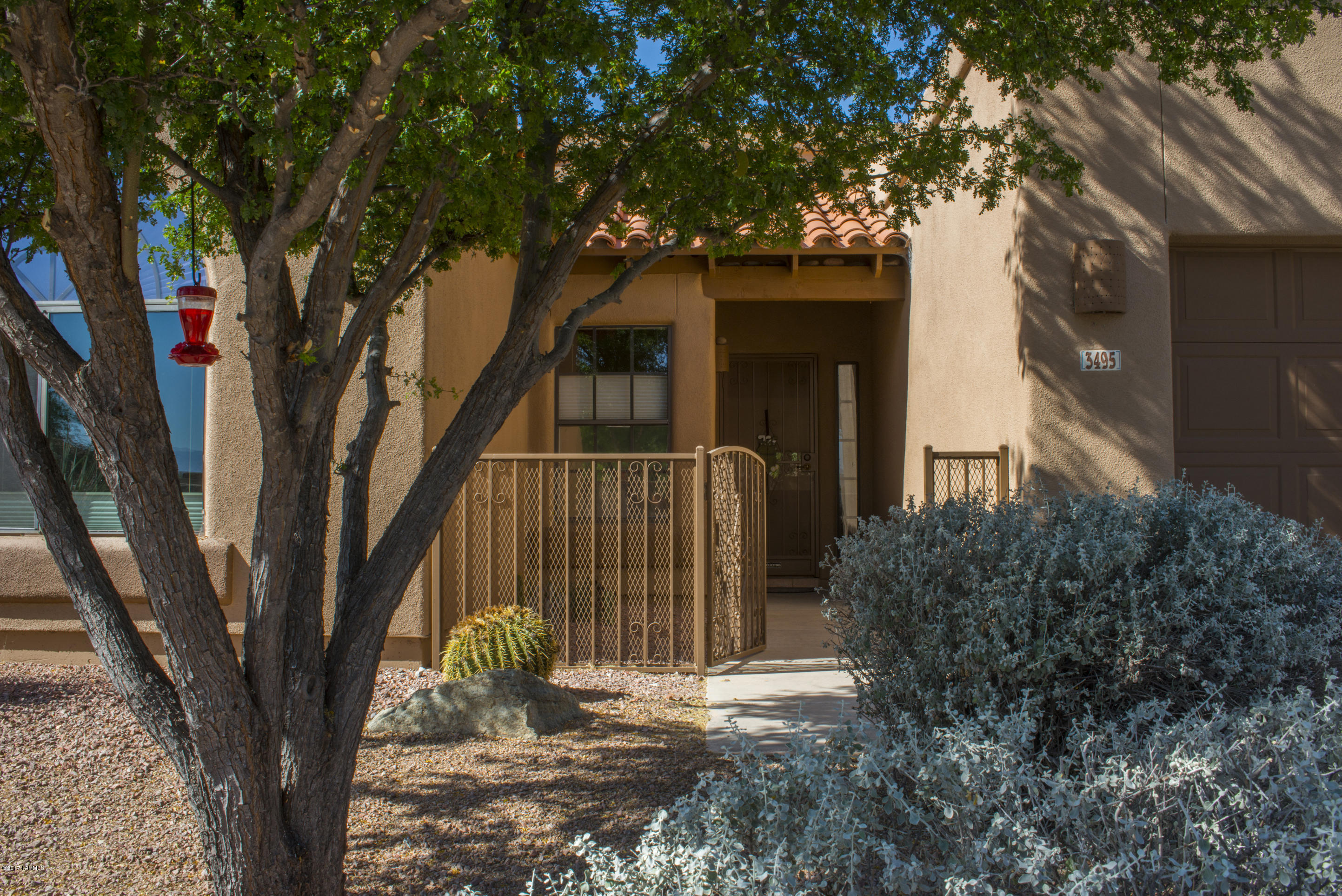 Popular floor plan designed & built by AF Sterling on a large lot with great landscaping and privacy. Located in a well established neighborhood w/ production & custom homes throughout.  So many improvements have been completed in this home by the original owners that we have created an 'improvement list'' & attached it to the documents in the MLS.  Starr Pass market is hot! We are so fortunate to be the home of the JW Marriott Starr Pass Resort and Spa, 27 holes of Arnold Palmer Golf, hiking, biking trails, multiple restaurants on site.  The foothills of downtown - minutes to cultural events, sporting events, hospitals, Raytheon, Caterpillar. Athletic facilities thru mem