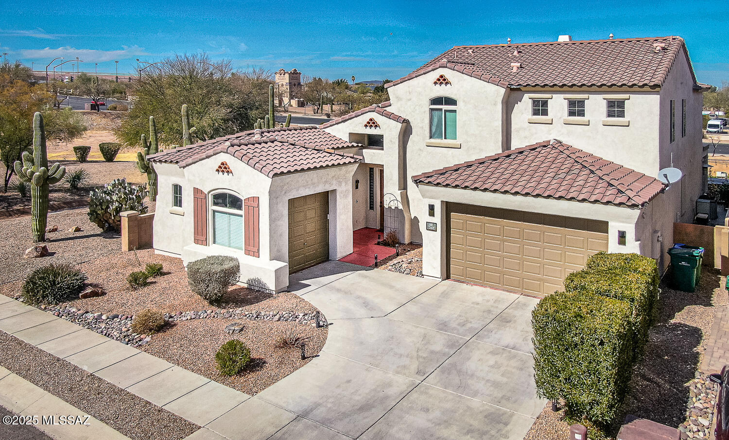 Your retreat from the modern world! This stunning 3123-square-foot, two-story home with sparkling pool is nestled on a private lot with no direct neighbors on one side and the back in the sought-after Presidio del Valle neighborhood. Inside, you'll find a floor plan that is a fusion of comfort and style, designed to bathe you in natural light. This inviting home offers four bedrooms, a den, two and a half baths, and a three-car garage. Stepping in, you're greeted by a formal living/dining room complete with modern ceramic tile flooring, which flows seamlessly through the main floor. The home's design effortlessly transitions into a vibrant great room, accentuated with soaring ceilings and a gas fireplace. The kitchen features Corian countertops, an abundance of cabinetry, stainless steel appliances, large pantry and a breakfast bar. The spacious owner's suite, conveniently situated on the main floor, features a walk-in closet and an in-suite bath complete with double vanity, walk-in shower, and a relaxing garden tub. Also conveniently located on the main floor is a versatile den/office and a powder room for guests. Upstairs find three additional bedrooms, a guest bathroom, and a spacious loft area, perfect for those relaxing and unwinding moments. Enjoy life to the fullest at the backyard oasis, complete with a pebble tech pool, lush turf, and an extended porch.
Additional features include a pocket office, laundry room fully equipped with a washer and dryer, and a 3-car garage providing a bonus space for an additional vehicle or extra storage. Fantastic location just a short distance from award-winning community amenities and lake, with easy access to the I-19 and shopping centers, this home truly has it all. All around a great home that you cannot miss.