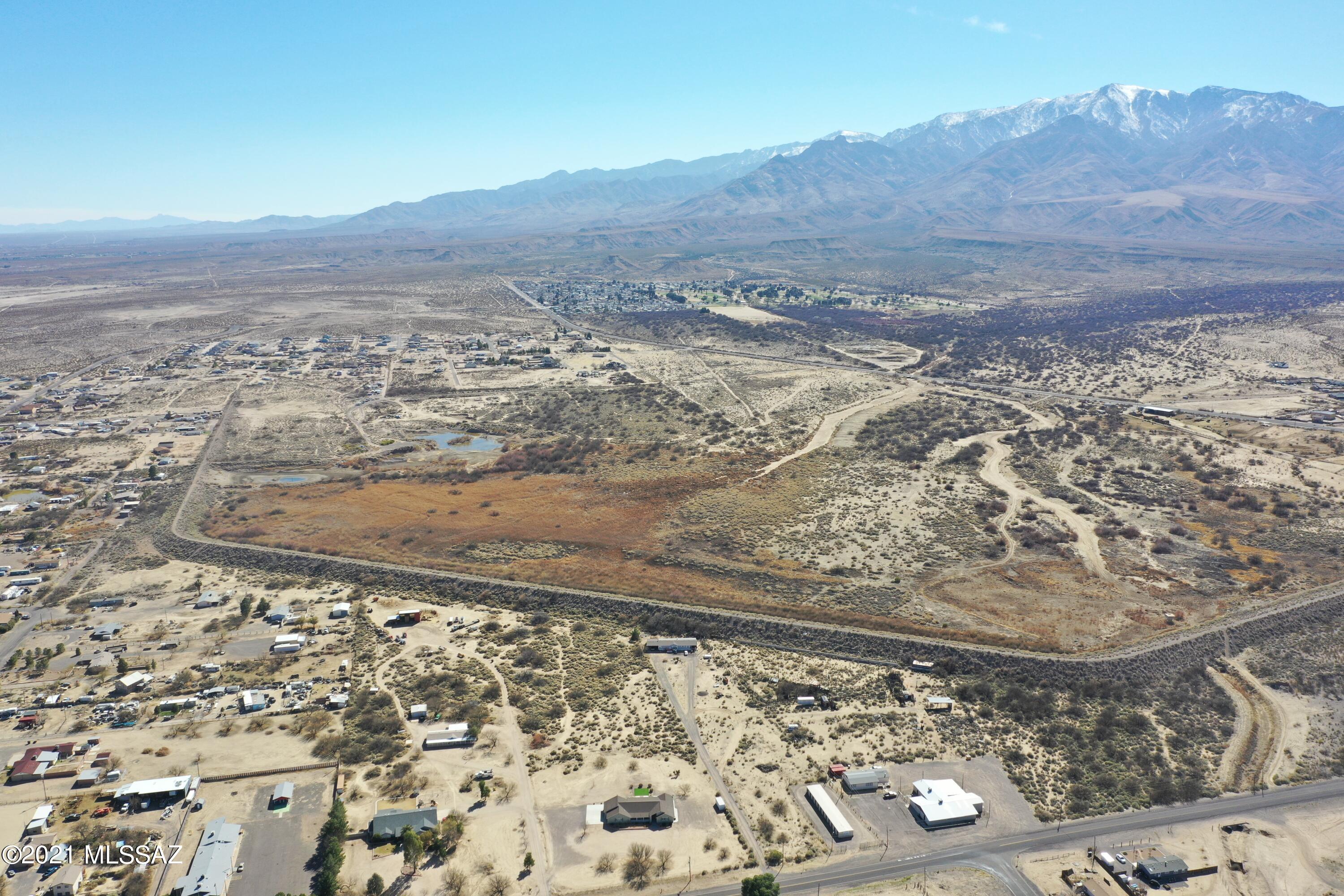 This 66 acre parcel is located just off of 8th Street in Thatcher and is zoned General Land Use. The portion of the land that is located behind the dam is in a flood zone but the land between the dam and 8th street is not a flood zone.
