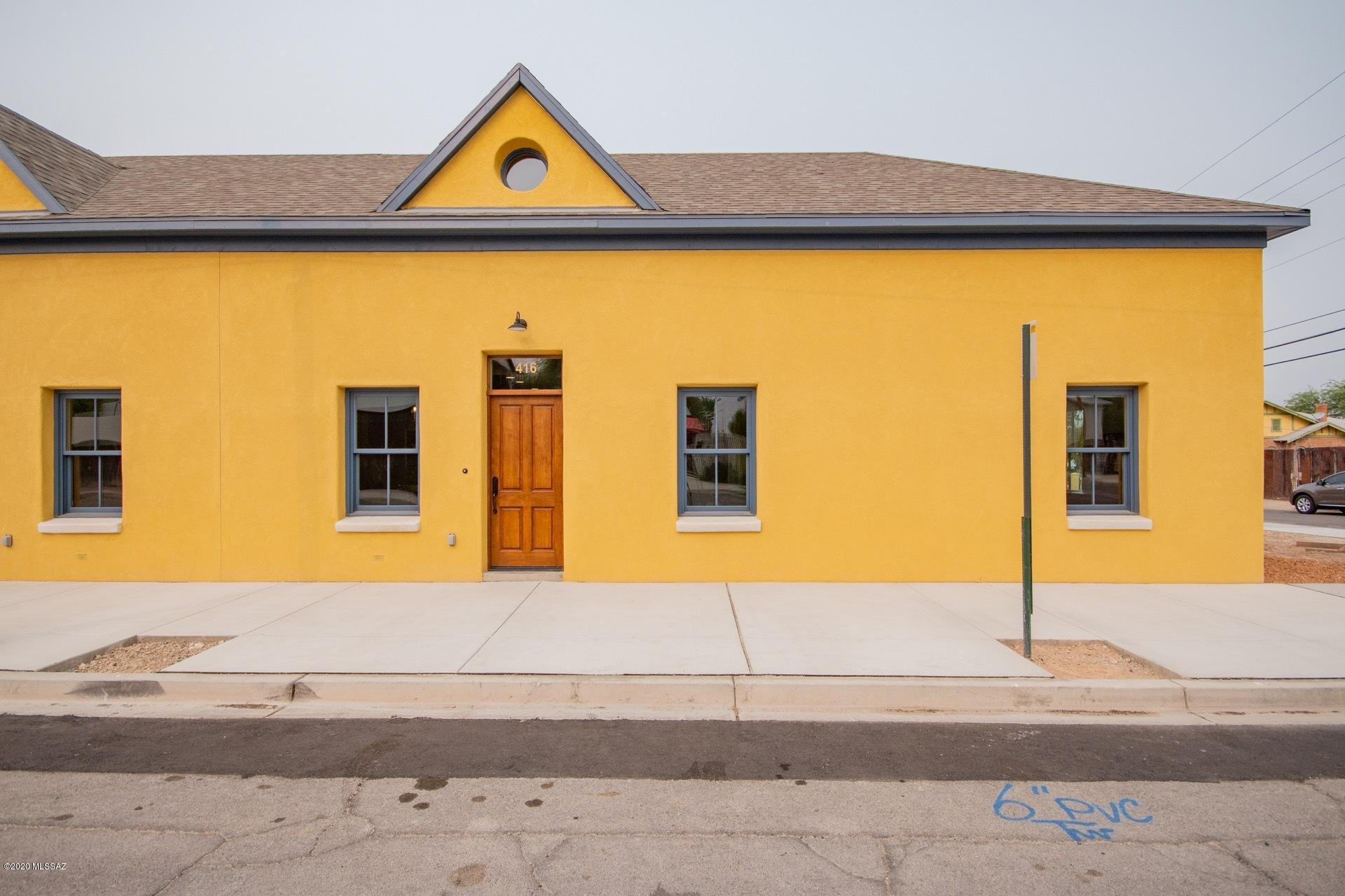 Rare opportunity to own a newly constructed masonry home in the heart of Tucson's Barrio Viejo. This historic style patio home is a 5-minute walk to the center of downtown, its restaurants and entertainment. Just a 2 minute walk to Tucson Convention Center where you can quickly access the Streetcar. You will also have quick access to I-10 and the Santa Cruz River Park and The Loop. This home features a first floor master bedroom, spacious open great room, colored concrete flooring, and 2 additional bedrooms in the cleverly concealed second floor. Outdoor living and entertaining can be enjoyed on your private pavered courtyard. This energy efficient home comes with a 16 SEER HVAC system and a 10-year builder limited warranty.