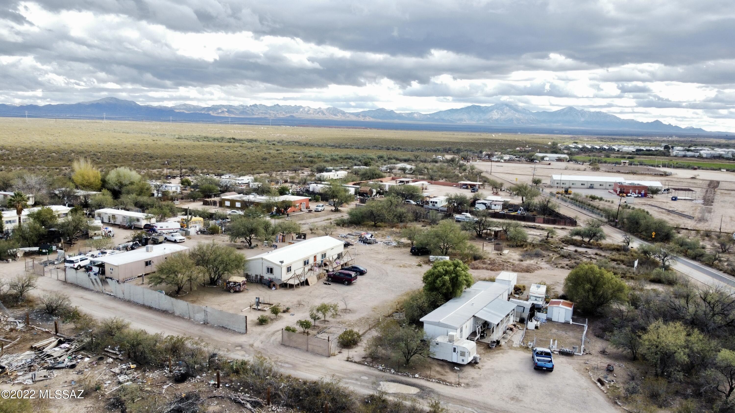 Almost an acre in a convenient location near Raytheon and Sahuarita/ Green Valley with manufactured home zoning- GR-1. Manufactured home on lot not affixed but tenant pays rent. Lease is up end of March 2023.  Private rural location, plenty of space for horses! DO NOT GO ON PROPERTY WITHOUT APPOINTMENT. MUST GIVE 48 HOURS NOTICE TO THE TENANT. 11725 S OLD NOGALES HWY for sale as well for $75K. Buy both lots and have 1.66 acres for a discounted price of $135K!