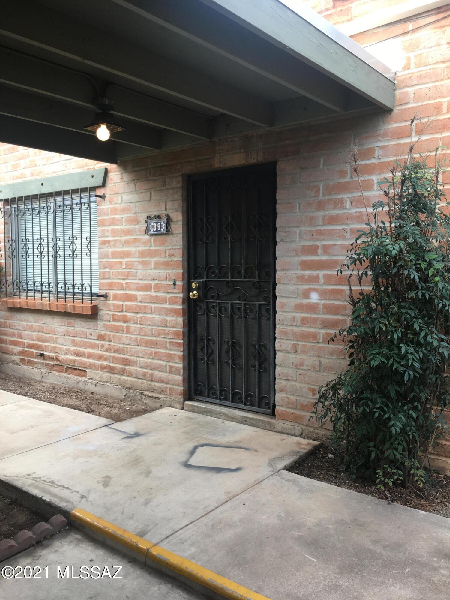 New appliances (refrigerator, oven/stove with smooth surface cooktop, and dishwasher), wood laminate flooring throughout! Includes full-size washer & dryer. Park right outside your front door in the covered 2-car carport with storage room. Community pool. NO smoking; small pets may be considered.