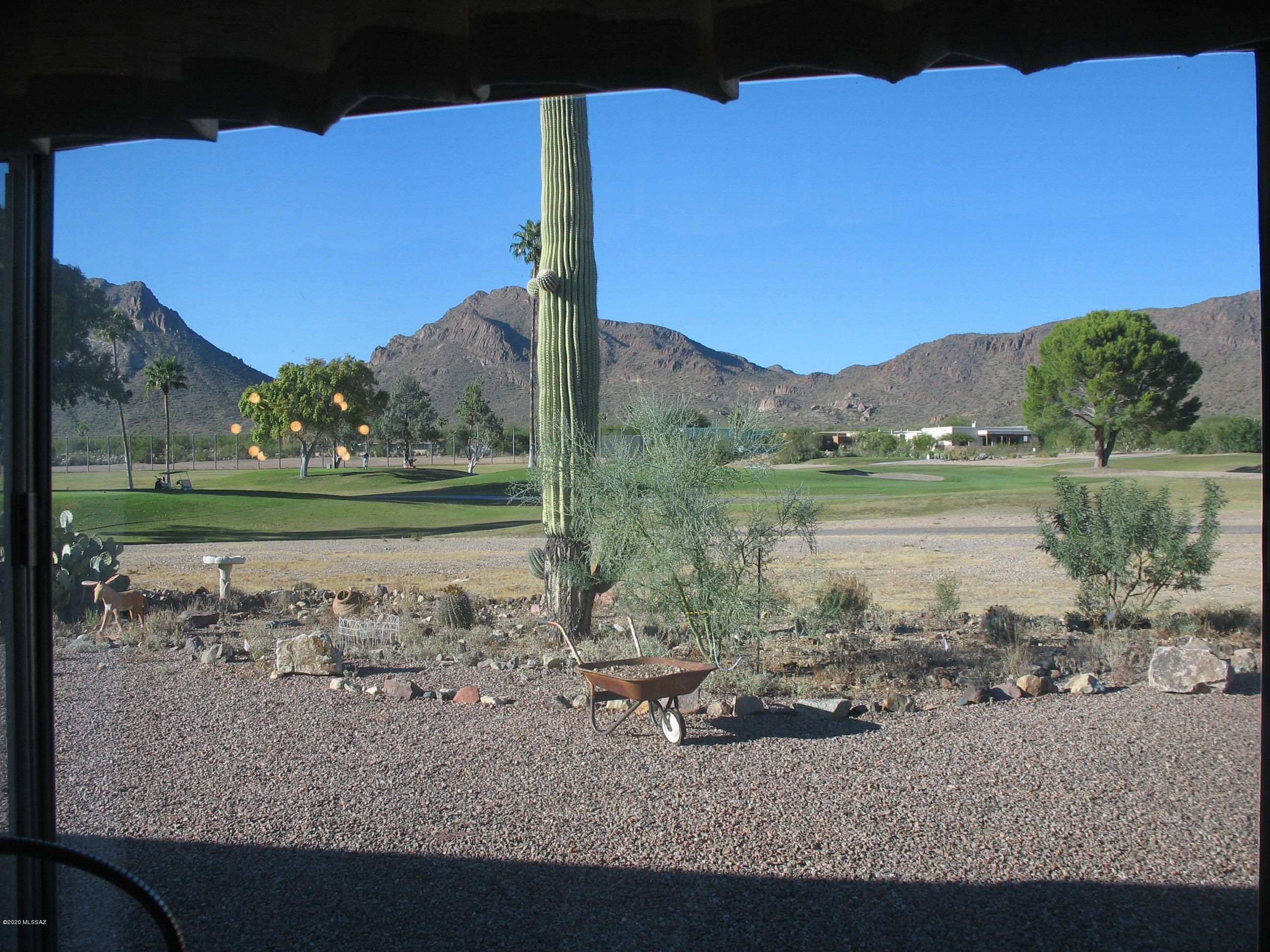 Golf Course Beauty!  Custom quality mobile home on the golf course with outrageous panoramic views of the golf course and mountains!  Four large windows in the living room and dining provide additional viewing from inside the house.  Open floor plan with no hallways.  Master bath has double vanity.  Newer high toilets in bathrooms.  Heating and cooling systems were new in 2019.  High-end vinyl flooring throughout home.  New lighting in kitchen and dining.  Master bedroom has two windows for cross ventilation.  The HOA fee includes unlimited golf, tennis, pickle ball, shuffleboard, 3 pools, spa, exercise room, trash collection, and a lot more.  You own the land!