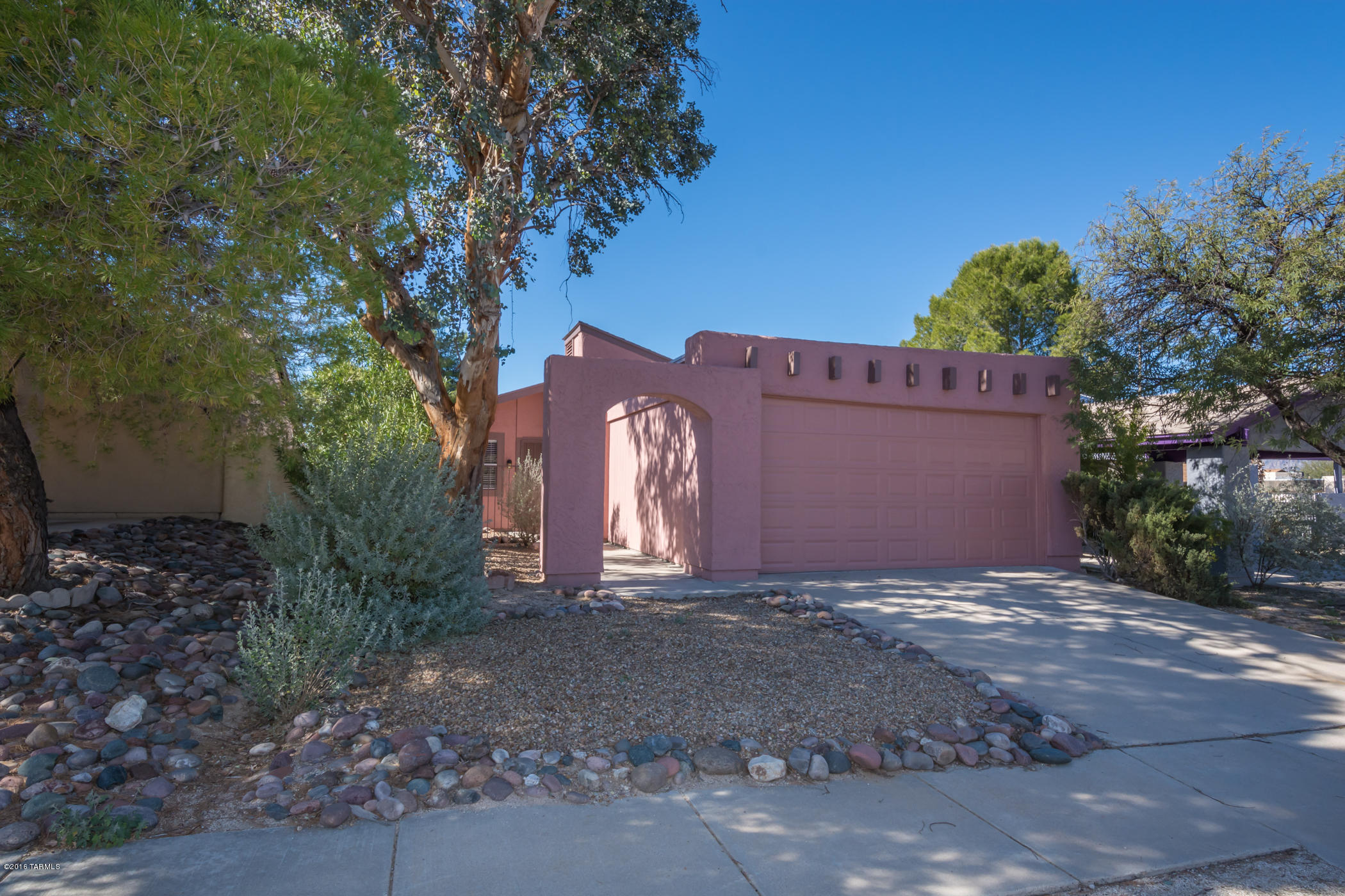 This Gorgeous Remodeled home is the one you have been waiting for!  Light, bright and airy, this charming home offers an updated kitchen with stainless steel appliances, tile counters and beautiful stone backsplash.  Both bathrooms have been beautifully modernized with tile surrounds, newer vanities and framed mirrors. Gorgeous ceramic tile flooring in all the right places.  Spacious open great room with French Doors going out to the huge backyard with a generous covered patio with brick pavers.  All this and a 2 car garage - plenty of room for all your toys!  Located in desirable Pulte East with no HOA, come see today!