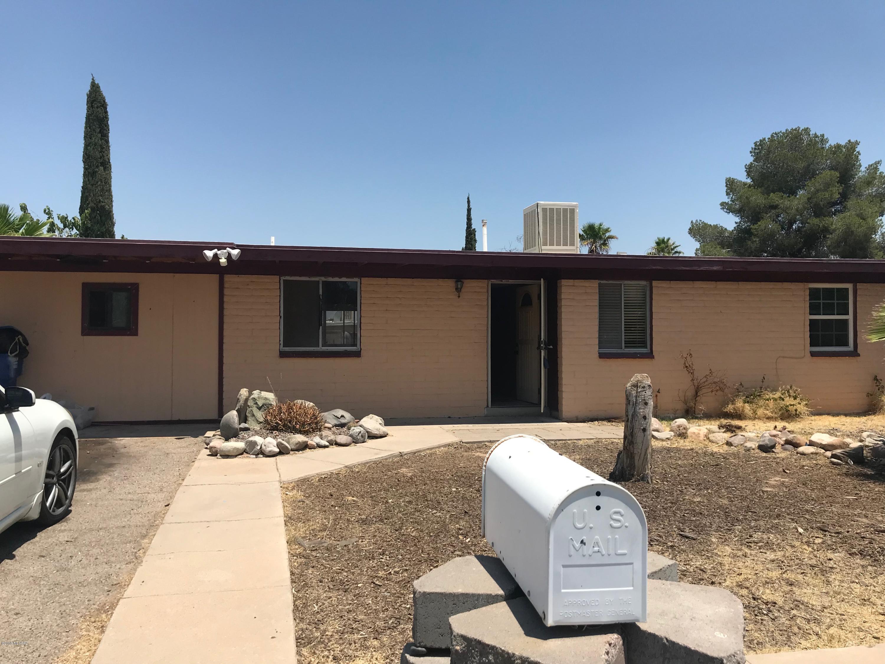 Four bedrooms, 2 bath! Carport has been enclosed to provide laundry and storage area. Rear patio is screened in. Large backyard.