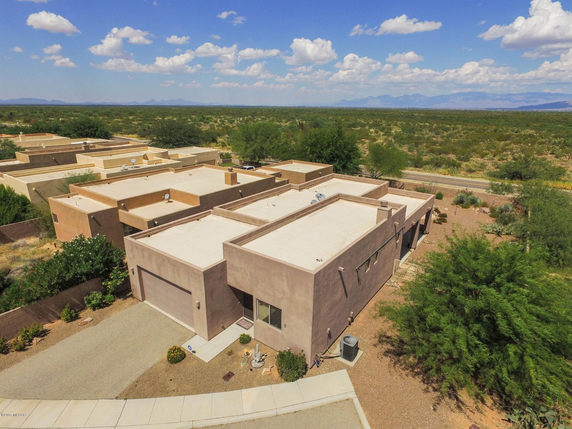 Highly upgraded home with no H.O.A.Beautiful Granite counters & alder kitchen cabinets with pull outs + S.S. appliances.Dining area,family room with fireplace & 8ft patio walk out door.Huge master suite with mountain views,walk-in closet,walk out patio door & custom executive height counters in master bath.Enjoy your evenings & views from  under the covered back patio area.Large walled in double gated custom landscaped back yard complete with water feature & room to store an RV,trailer or build another garage.Highly rated Vail school district this is a must see home!Roof just re-coated in Oct awesome move in ready home.USDA 100% FINANCING