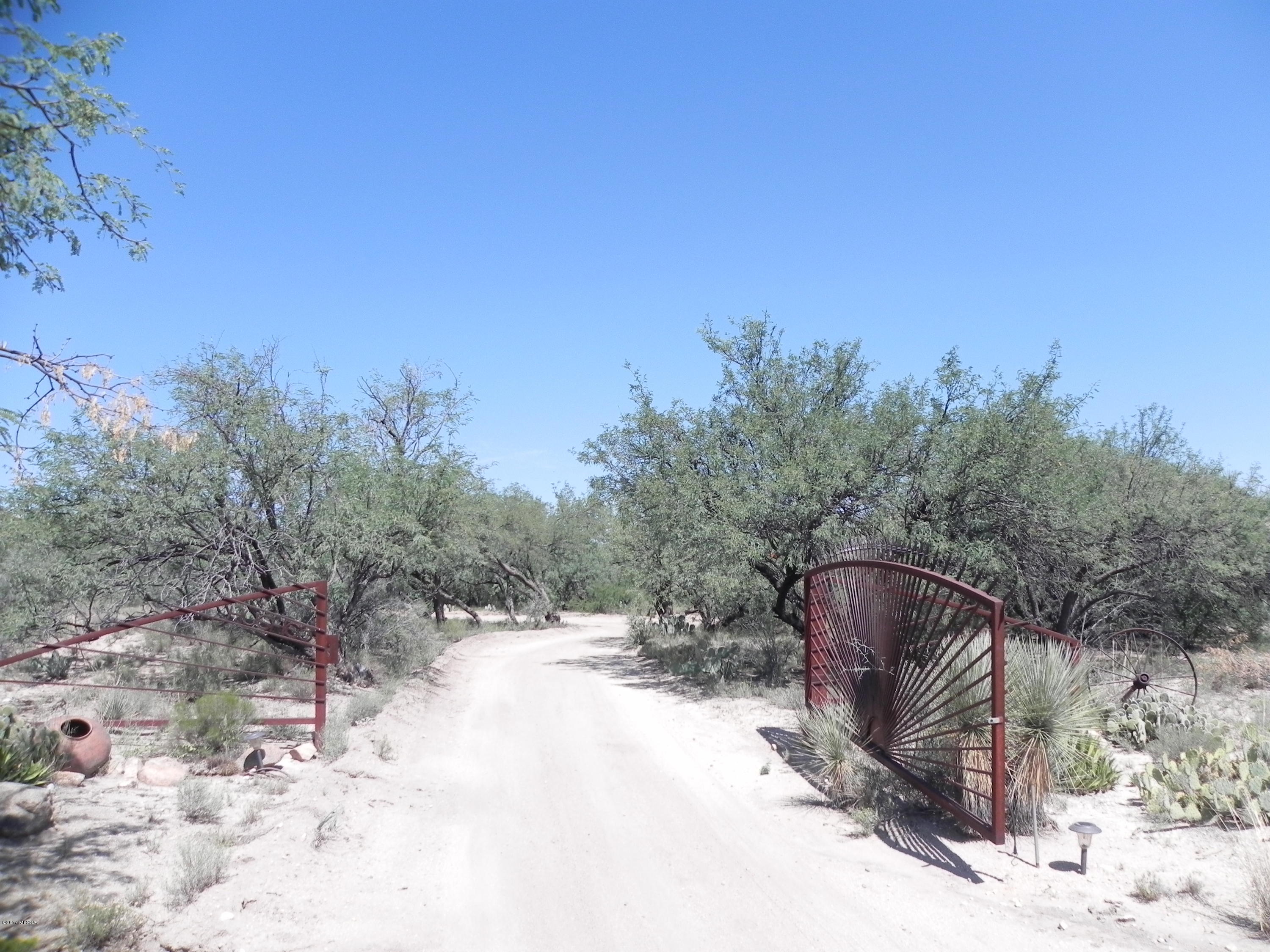 If you've been looking for space, privacy and tranquility to build your dream home, then look no further than this 4.5 acres of natural desert which has been reserved for a custom home.  This beautiful parcel of land is a unique find which features the charm of the desert while still being close to area shopping and amenities .  Approximately 15 minutes to I-19, Rancho Sahuarita Market Place and Green Valley and approximately 30 minutes to Tucson.  Water, electric and phone on the lot make this land very affordable to build the home that you've been dreaming about.