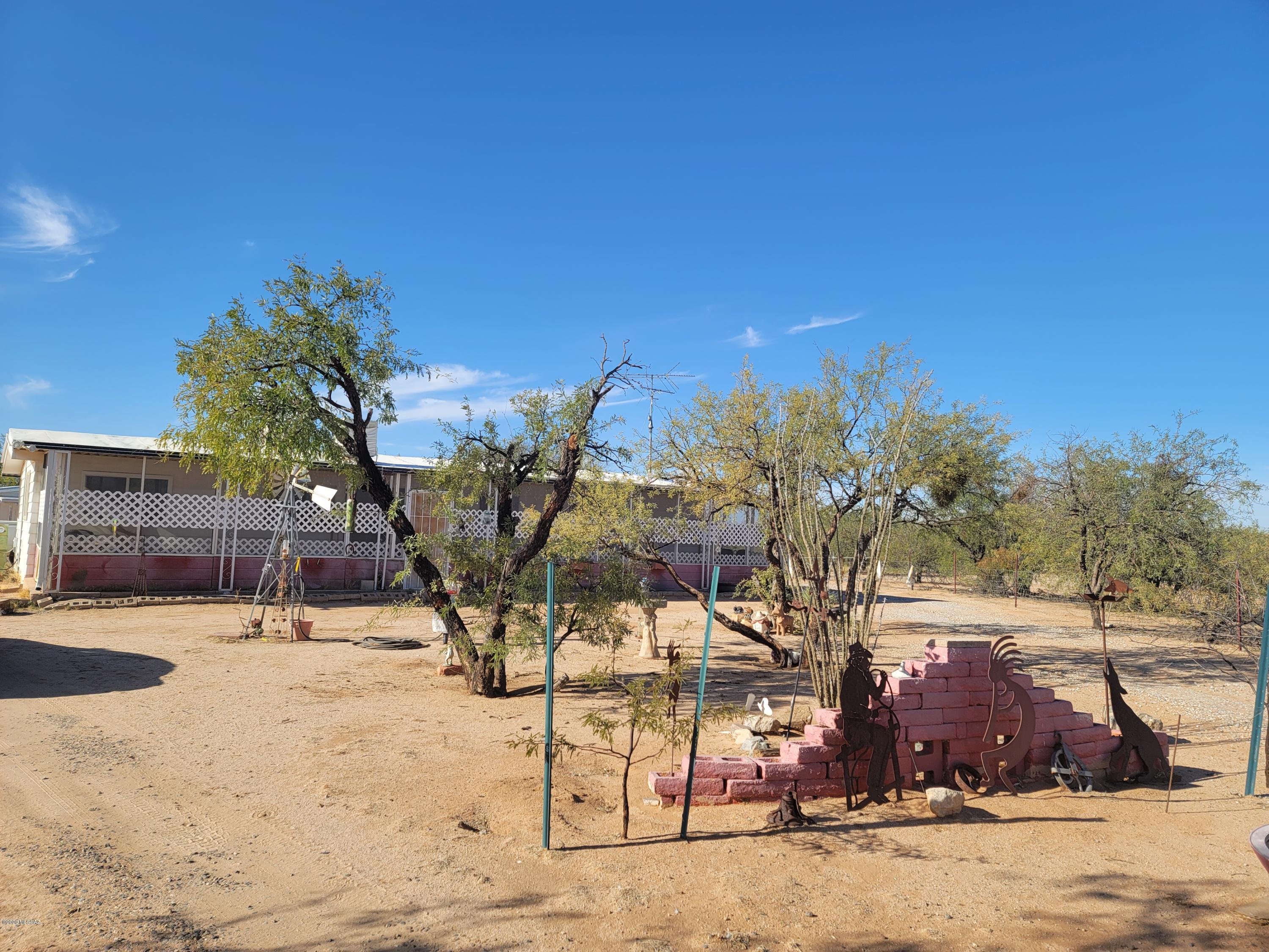 WANT MOUNTAIN AND SUNSET VIEWS? LOOKING FOR OVER 4 ACRES FOR UNDER 100K!? HERE IT IS. THIS SPACIOUS MANUFACTURED HOME IS SOLID AND IS MOVE IN READY. HOME FEATURES 2 BEDROOMS AND 2 BATHS. HOUSE HAS PLENTY OF STORAGE SPACE AND LOT HAS 2 SHEDS WITH MORE ROOM. BRING YOUR TOYS AND PONIES. YOUR NEW HOME WELCOMES YOU!