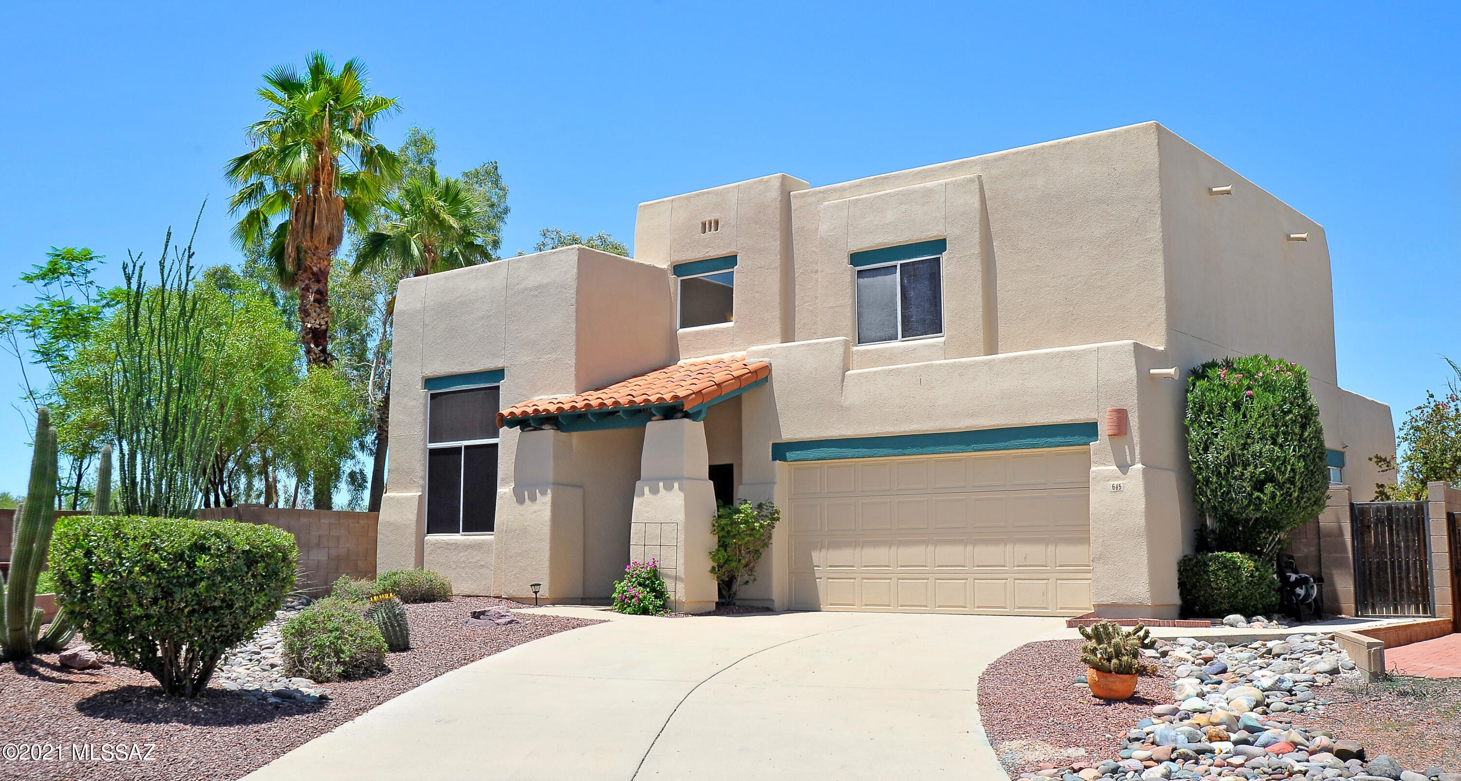 Seller will accept or counter offers $420K-$445K.  Amazing home on a quiet cul-de-sac! Soaring ceilings, Kitchen with Center Island that overlooks the Family Room, with Beehive Fireplace and exquisite Mt Views.  Upstairs master suite w/ bay window, his and hers walk in closets & adjoining deck to enjoy the unobstructed sunset and Mt vistas! Private backyard oasis W/ faux flagstone patio, pristine pool & jacuzzi, rock waterfall, several varieties of colorful vegetation, 4 citrus trees & forever protected views!