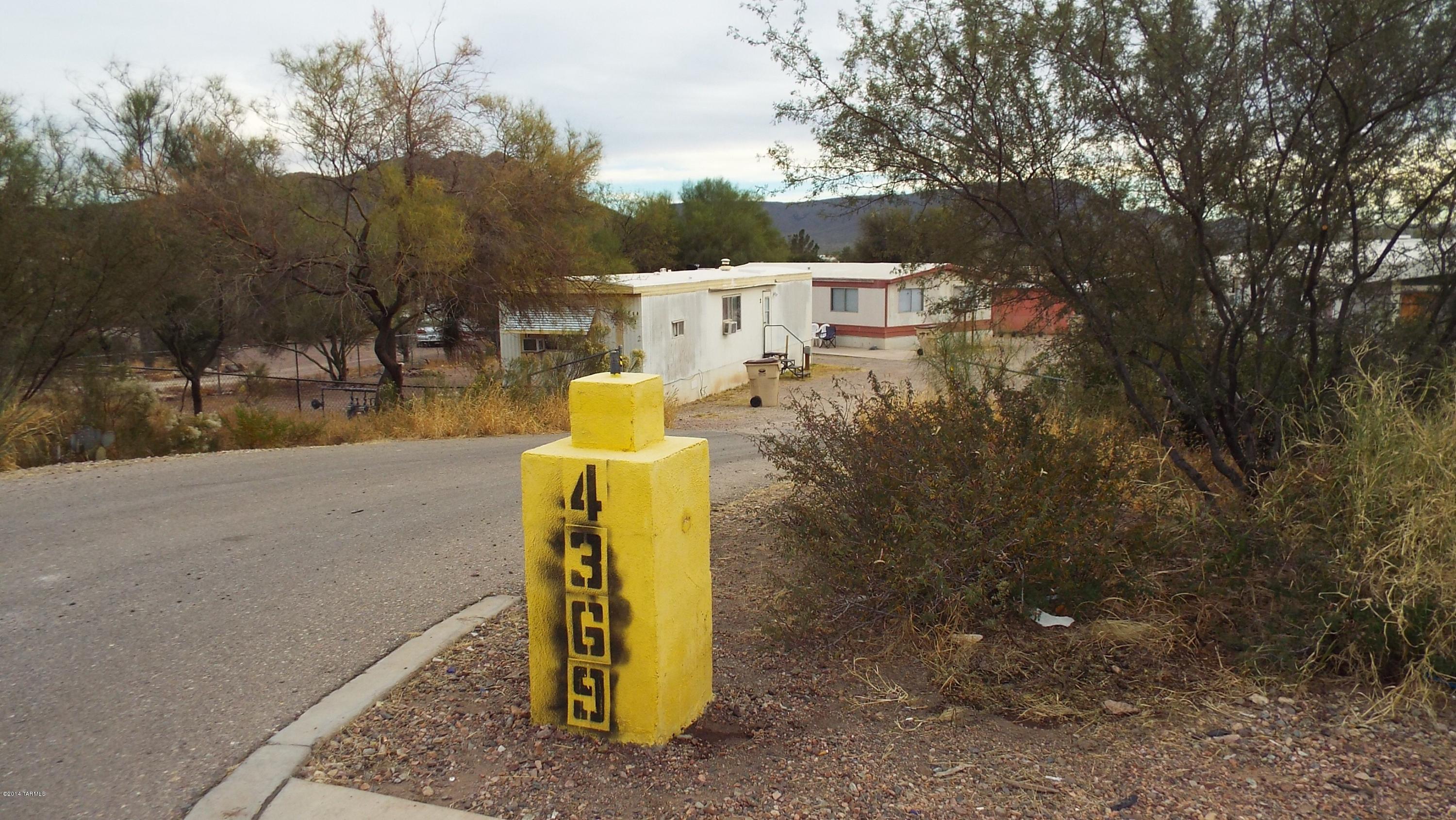 This is a great income opportunity, priced to sale with a positive cash flow. The property contains, 3 unfixed mobile homes, 1 affixed mobile home, 1 site built home and 1 fenced storage yard with office, that could be used to add additional units. The storage lot and office  are separately gated and fenced. Also, tenants pay Gas, Electric, water.