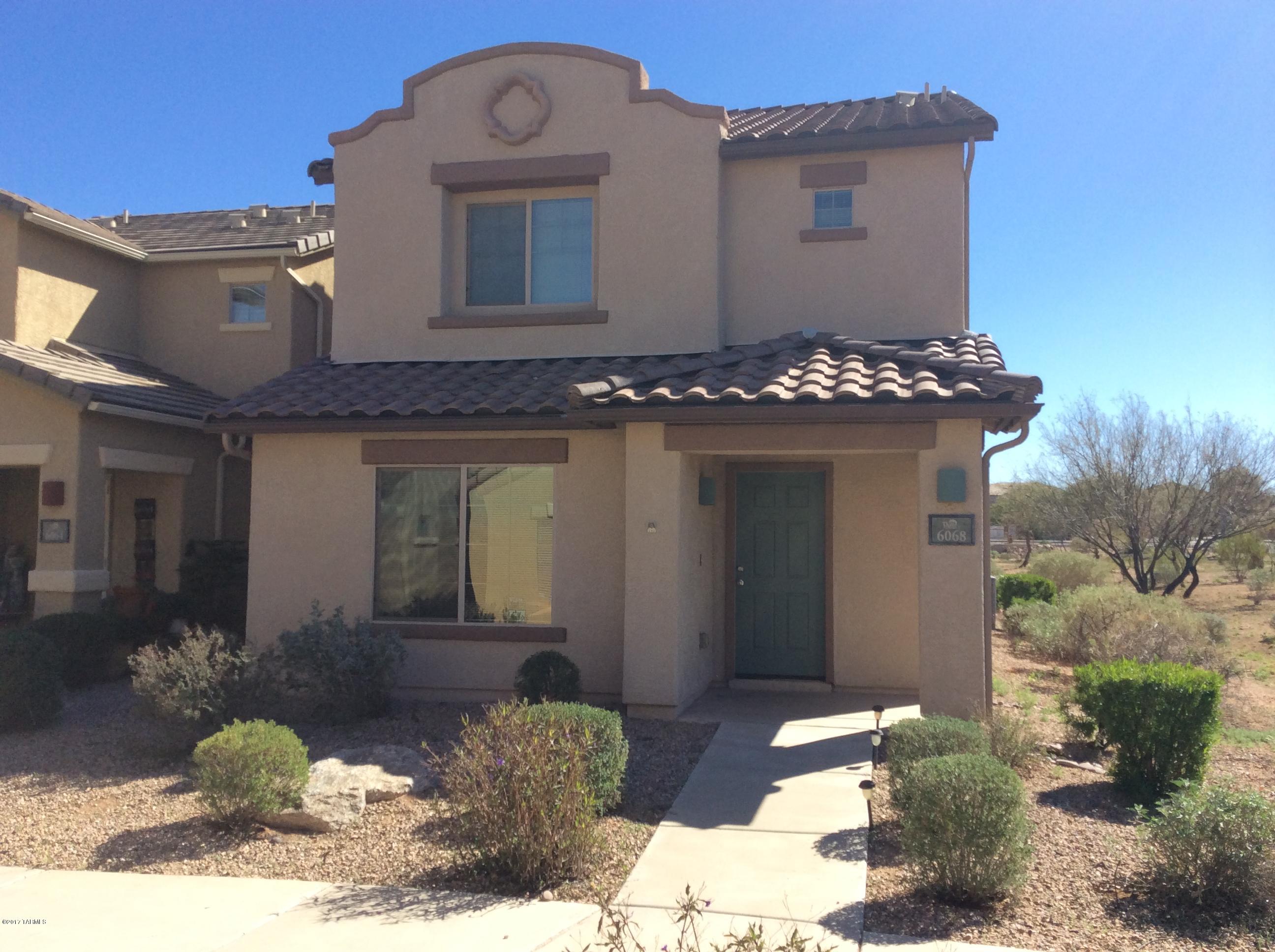 Move in ready 3 bed, 2.5 bath home located in Sierra Morado. Also located in desirable Vail School District. Upgraded 18' tile and plush carpeting. Roomy kitchen with all appliances. Extra windows in living room & dining area allow for natural light. Paddle fans throughout. The laundry room is located upstairs next to all bedrooms. Lots of storage including a walk in closet in master bedroom. TEP Guaranteed home with a solar hot water heater & dual pane windows will keep your electric bills down in the summer. HOA covers: community pool, rec center, basketball court, jogging paths, dog park & front landscaping. Minutes from Raytheon, DMAFB and I-10. View this beauty today! Call co-listing agent for a personal showing.