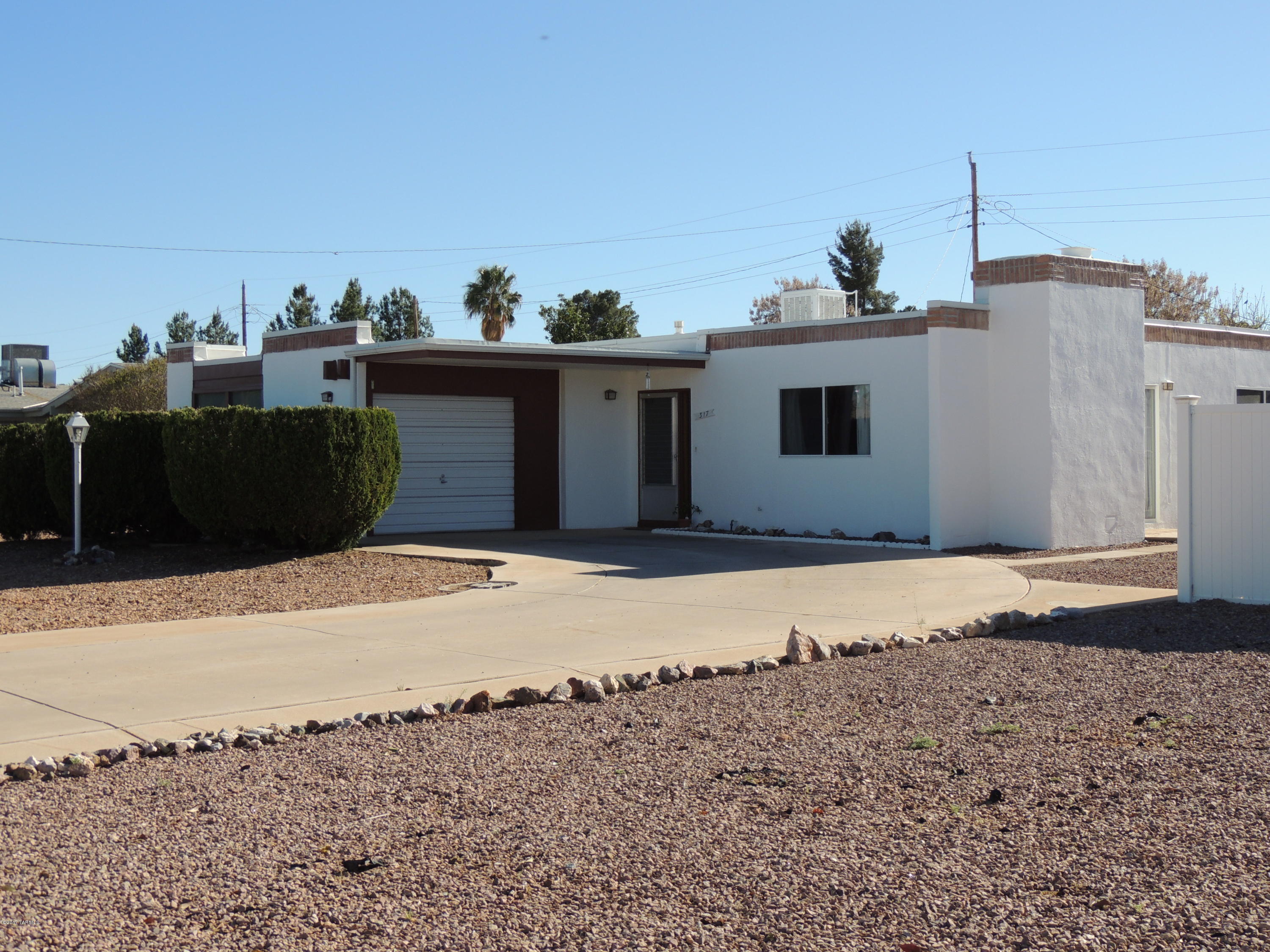 Price just reduced! Perfect retirement getaway or full time residence. This great home has nice upgrades and virtually a maintenance free yard that is fenced in the back for your four legged family. It also has a great enclosed Arizona Room that would be perfect for a game room/exercise room, office or just a quiet retreat. Call today.