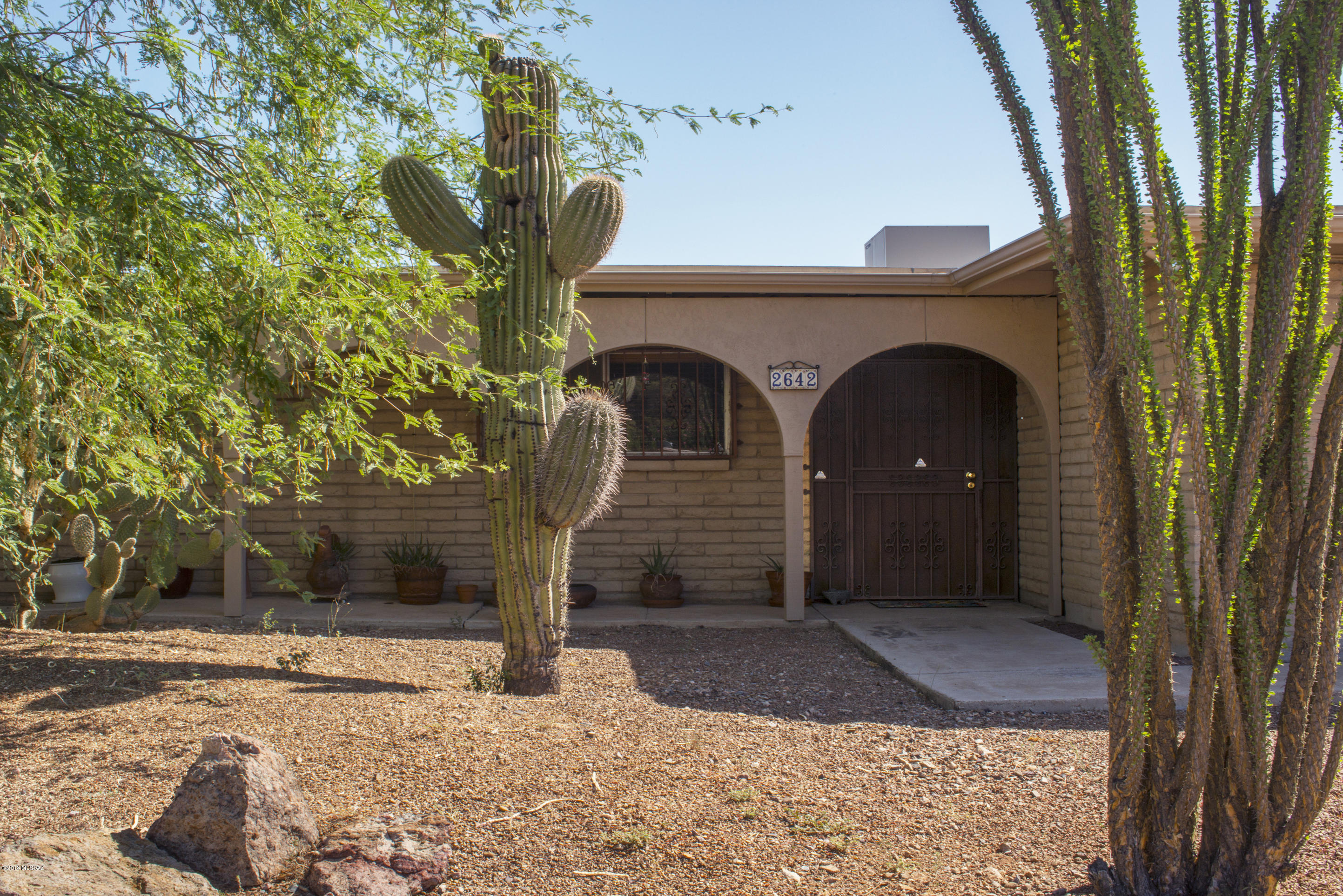 Tucson Park West's most popular subdivision just East of Starr Pass.  Terrific established neighborhood W/ tremendous pride of ownership throughout the community. Great floor plan w/ large living room fireplace dining room - wraps around to upgraded kitchen more dining & family room.  Three good sized bedrooms both baths totally remodeled & classy.  Primary bedroom large walk in closet & designer paint.  Front yard easy to maintain on large streets & good side yard setbacks.  Rear yard fantastic porch, pool entertainment center - lots of play room, extra parking - just very flexible & refreshing.  Elementary & Middle school just around the corner.  Close to JW Marriott, I-10 U of A, Airport, Raytheon Downtown Cultural Center, Arts Theater yet surrounded by the beautiful Sonoran desert.