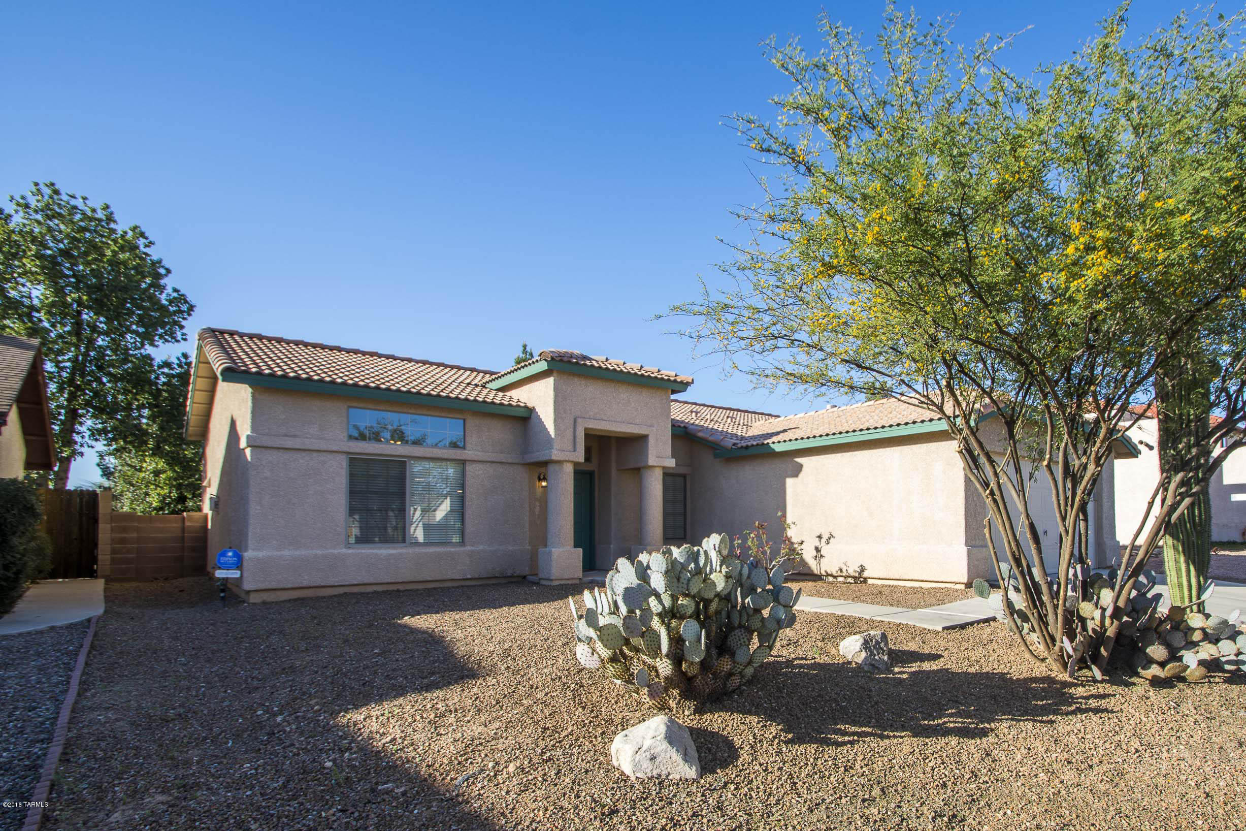 Beautifully updated 3 BR - 2 BA home located in desirable Linda Vista Estates. Open floor plan with lots of light and gas fireplace in great room.  Clerestory windows over doors and windows for added light.  New gas stove, dishwasher.  New tile, carpet and paint throughout.   Private, well shaded backyard with lots of room for plantings or play area.   Tile ROOF!!   A must see!  Home is not on a through street!