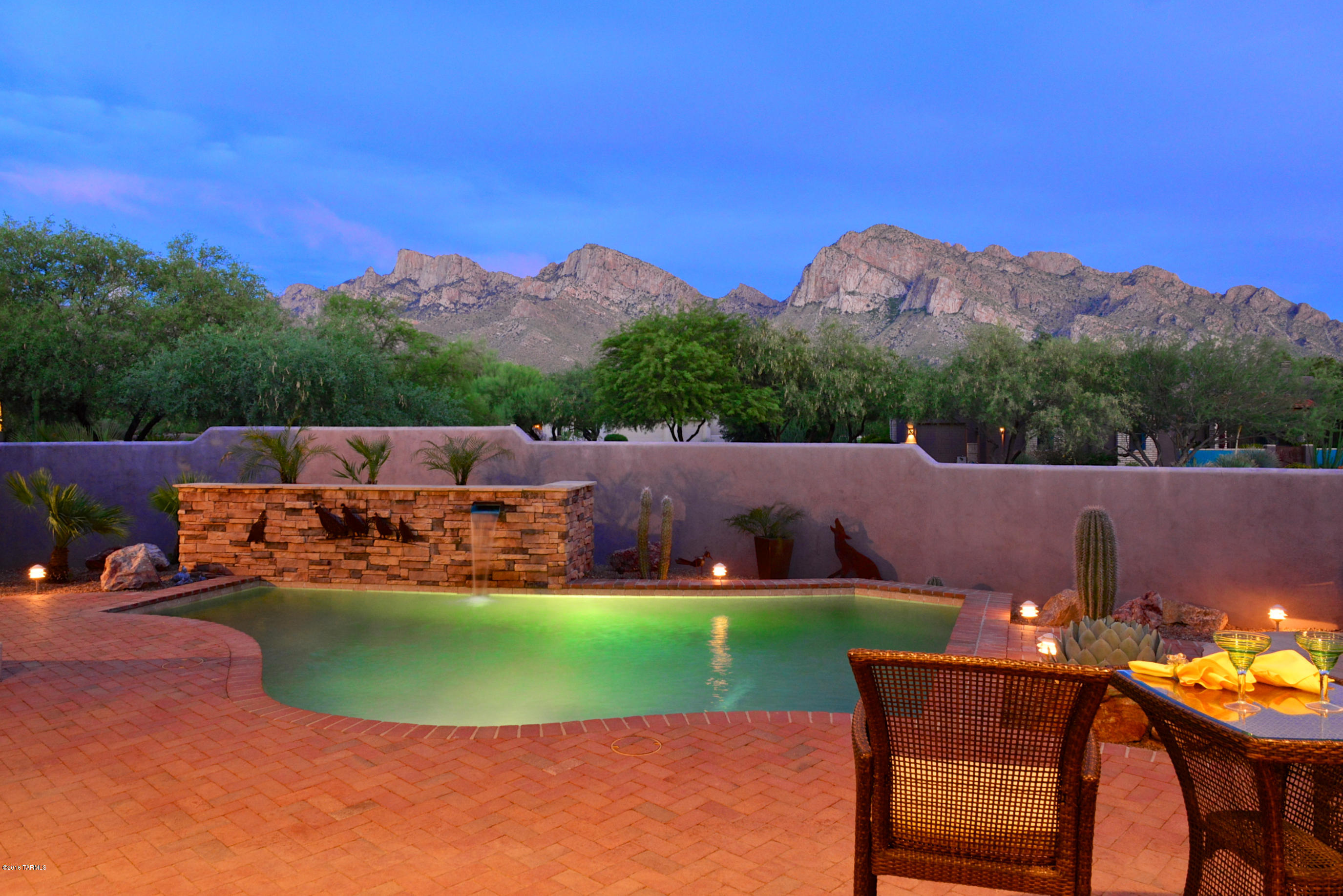 Enjoy exceptional and serene Catalina Mtn views plus privacy in Oro Valley Country Club, the new “in place” in Oro Valley, the “Scottsdale” of Tucson! SE-facing large patio with sparkling pool, built-in cov'd BBQ area and many fruit trees. Splendid 2,842 SF great room style SW Contemporary: All Tile Floors, 3BD or 2BD/Den, 3BA & Multi-Purpose Room plus 3-Car Garage! Inviting courtyard leads to open great room with glorious mountain views. Wonderful chef's kitchen with slab granite, large island, SS appls, prof hood over cooktop (GAS avail!) and informal dining with patio, pool and mountain views. Master suite with patio access and 2 walk-in closets. Split layout with second suite with patio access plus add’l room with separate entry and private patio. Perfect seasonal or annual A