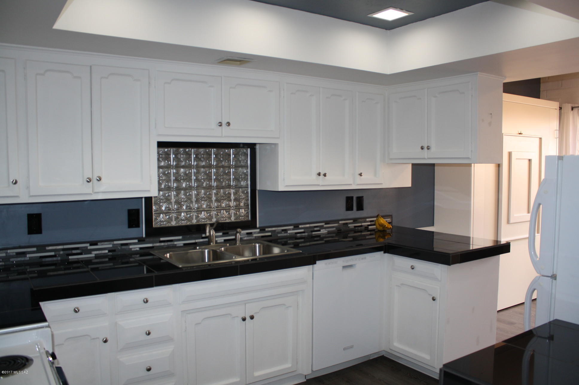 This charming 1BD/2BA townhome is located within the gated community of Skyline Country Club Estates.  Beautifully updated kitchen and master bath.  Spacious master bedroom suite with access to the patio.  Fabulous mountain views!  Fenced backyard with dual patios and an interior courtyard at front entry.  Ground level, single-story with attached 1 car garage.  Enjoy some of the amenities the Country Club has to offer; golf, tennis, dining, fitness.  Call today for a showing!  This one won't last long! Can be rented furnished or unfurnished for $1,600/month.