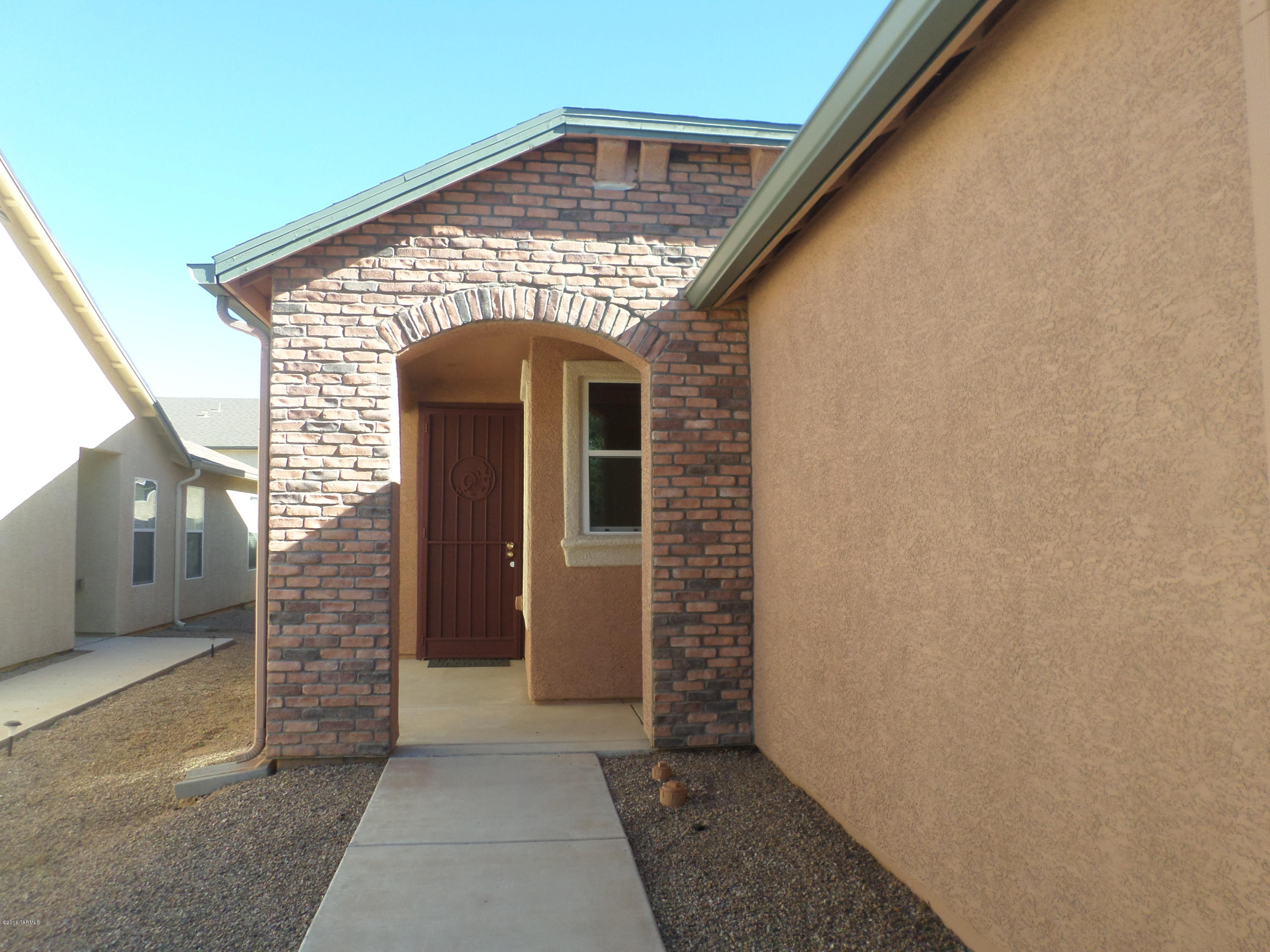 Adorable move-in ready!! New interior two-tone paint/exterior paint and new carpet.  High ceilings, tile in living areas. Kitchen has cherry cabinets and breakfast bar and pantry. The master bath has dual sinks with cultured marble countertops.  Separate shower/garden tub and a large walk-in closet.  Roomy backyard with covered patio.  Garage has new epoxy paint.