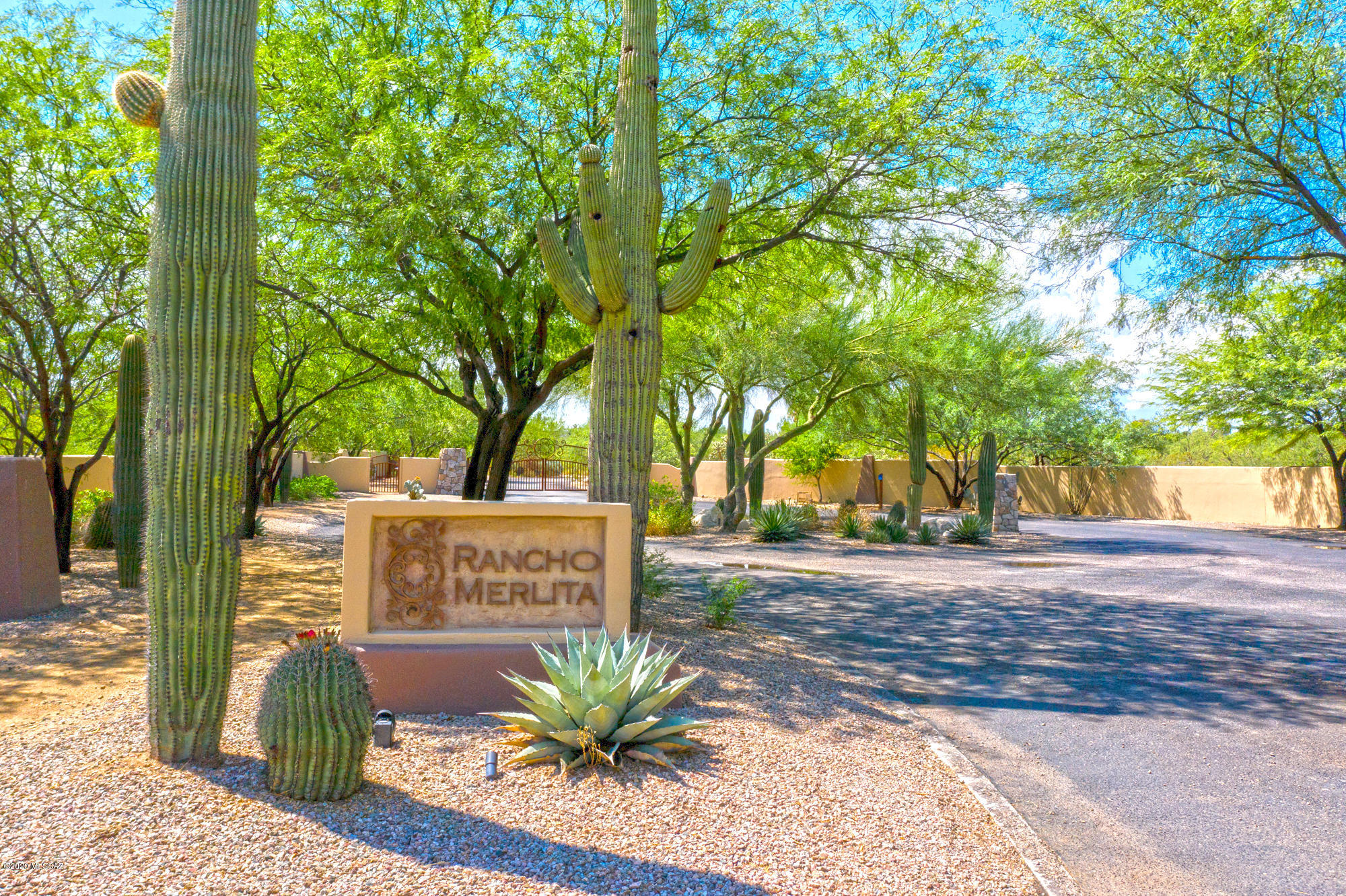 Tucked away in the lush mesquite groves of the Tanque Verde Valley, once the historic desert escape of Merle Norman, pioneering cosmetics entrepreneur, you will find El Rancho Merlita. Within this gated community five sizable lots are still available . Select your architect and builder for your dream home for this Tranquil desert oasis with mountain views yet minutes from north east side shopping, entertainment and restaurants.