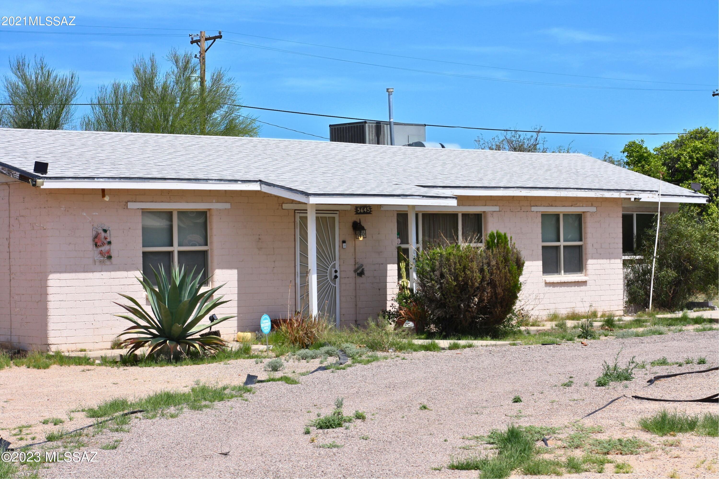 Looking for a fixer-upper that's full of potential in the heart of Tucson? Look no further than this centrally located gem. Perfect for someone who wants to create their dream home or rental property. Located just 30 minutes from the University of Arizona and 10 minutes from Davis-Monthan Air Force Base this property is surrounded by great restaurants, shopping, and entertainment. With a little love and attention, this house has the potential to be a true gem. Featuring 3 bedrooms and 2 full bathrooms, this property offers plenty of space to make it your own. Don't miss out on the opportunity to turn this fixer-upper into your dream home or rental in a prime location!

This property is to be sold AS-IS with no concessions.