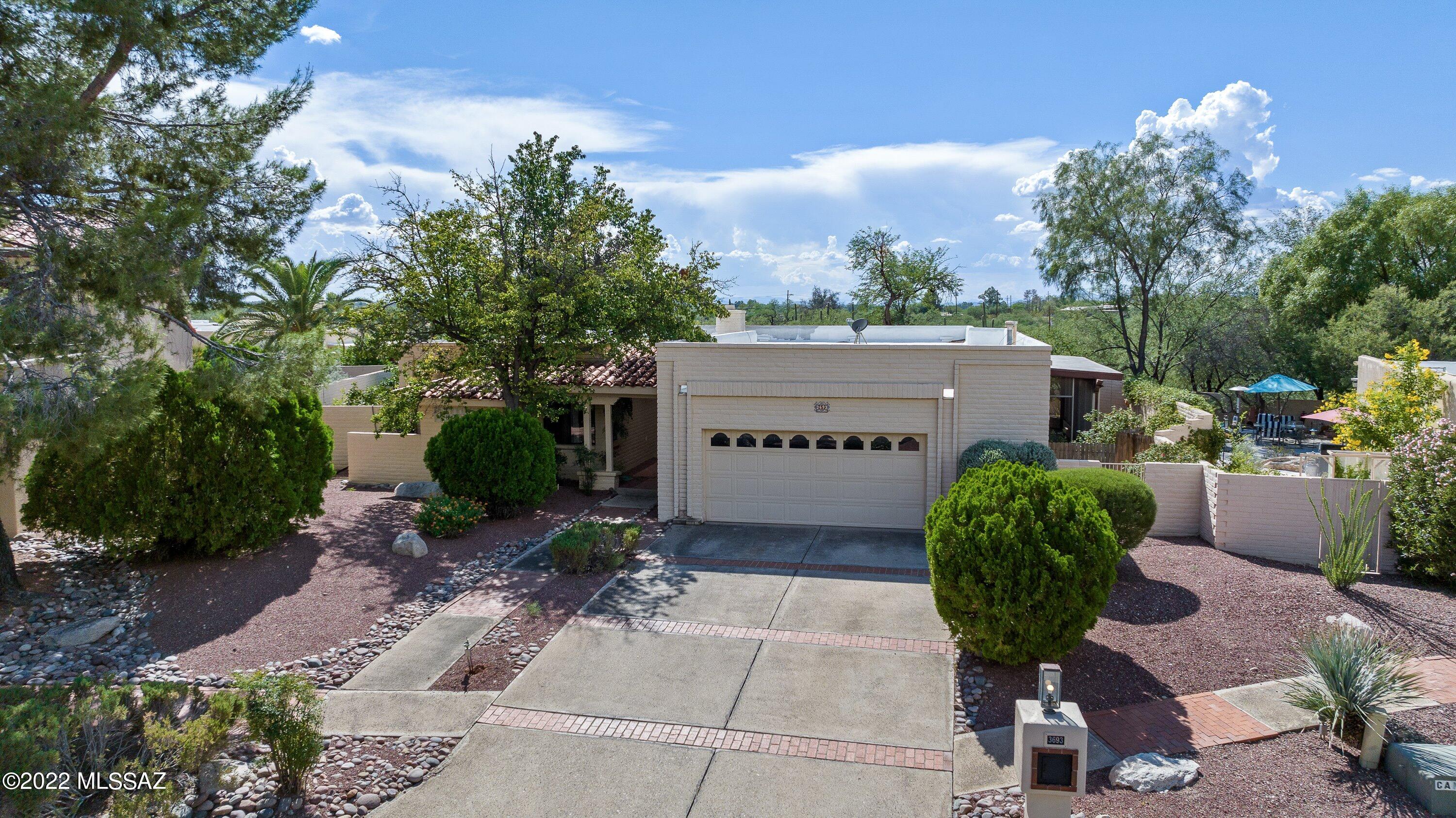 Charming large 3bd/3bth family home in Sabino Vista Village. Beautifully maintained neighborhood with tree lined streets. Community pool and club house located right around the corner, perfect for cooling down in the summer heat and hosting events. Down the street from Sabino Canyon where many locals love to hike. Spacious 2 car garage with lots of storage and workshop. Updated paint and floors in master bedroom and one spare bedroom. Newly tiled laundry room. Dual AC units to control both sides of the home. Plenty of opportunity to customize this home to your vision!!

Guest bathroom is currently under construction, all fixes and remodel will be completed before closing.