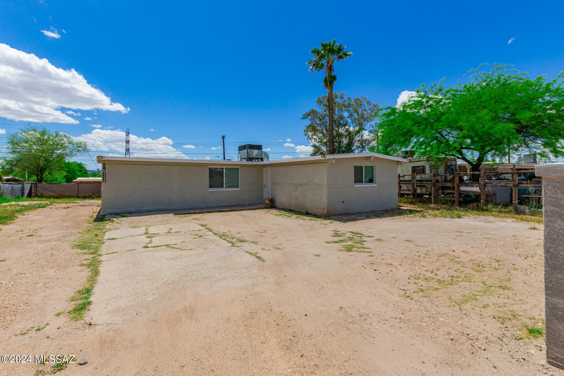 This 4 bedroom 3 full bathroom home was completely remodeled 2 years ago. Kitchen features white cabinets and stainless steel appliances, and laminate flooring throughout. 
Property is sitting in a .19 acre lot with a block fence on the front. Great location very close to I-19 and Tucson Spectrum.