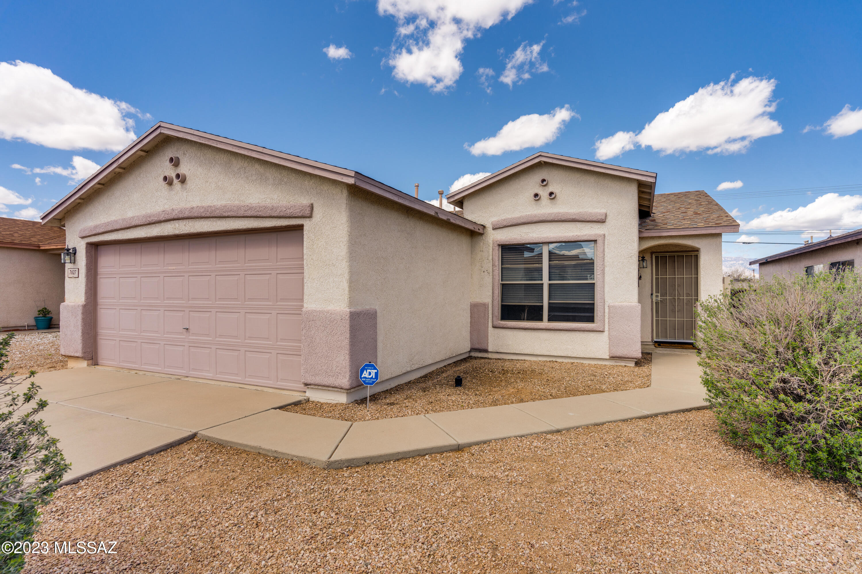 This remodeled home is located on the East side of Tucson and boasts 2 bedrooms + Den & 2 bathrooms. Features include open floor plan that seamlessly connects the living room, dining area & kitchen. The kitchen is fully equipped with stainless steel appliances & ample cabinet space. The primary bedroom is spacious & features a walk-in closet & en-suite bathroom, complete with a walk-in shower. The backyard is fully fenced & features a covered patio w/extended pavers, flagstone patio, synthetic grass and raised planters, perfect for outdoor entertaining. The property also includes a two-car garage, providing plenty of space for parking and storage. This remodeled home is conveniently located close to schools, parks, shopping & restaurants. Call today for your private showing!