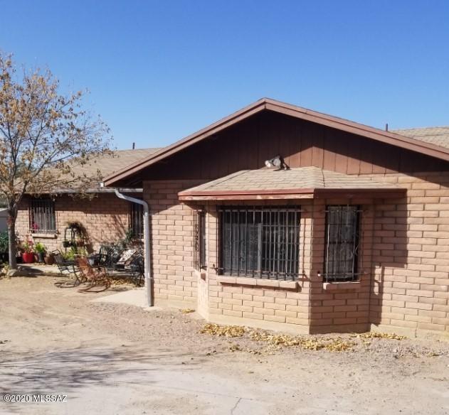 Garage has been enclosed to make for a large  Family room.