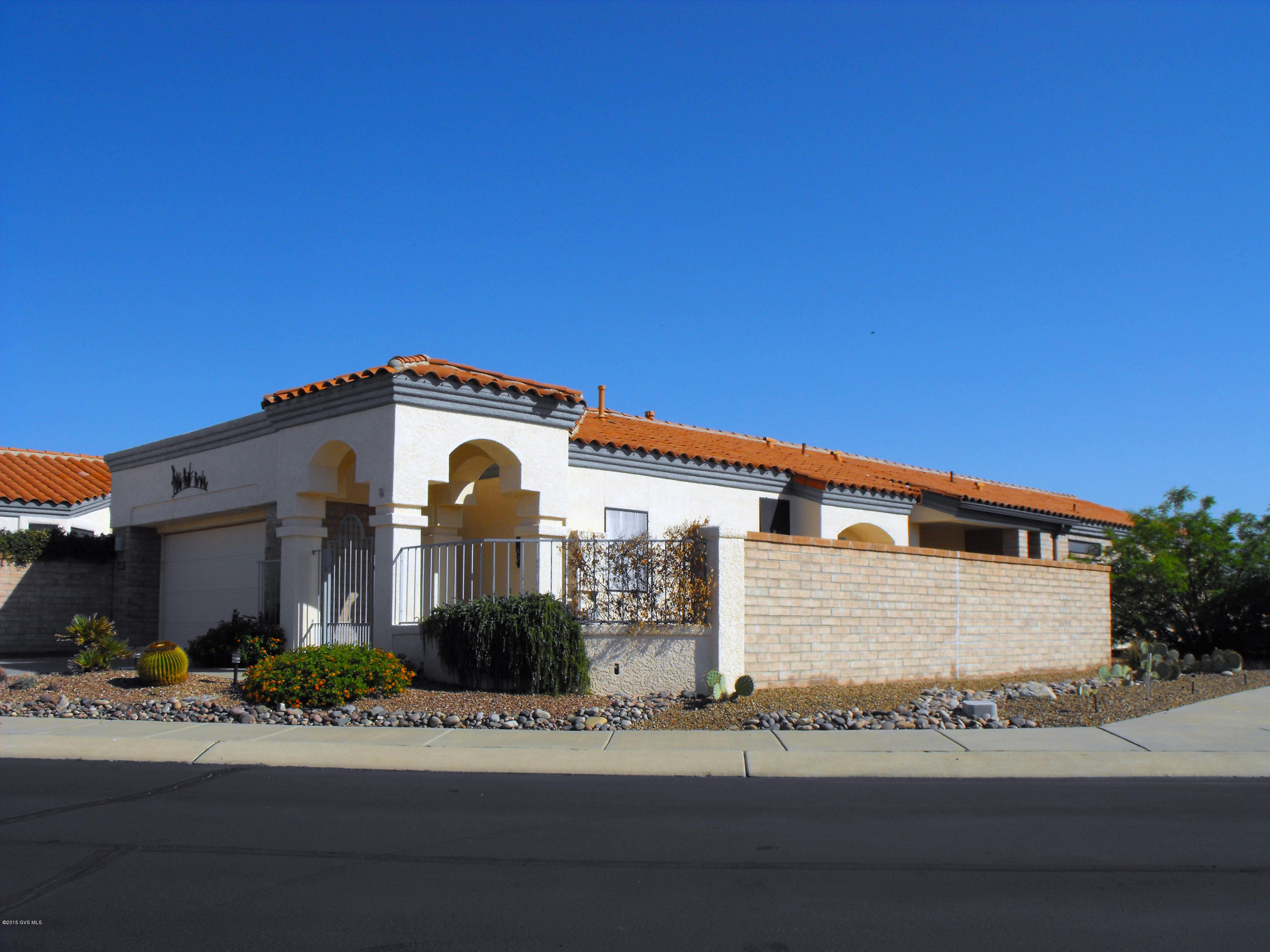 This home sits high on a ridge offering panoramic views of the San Ignacio golf course. The inside is designed for privacy. You'll find two master bedrooms each with its own ensuite, a living room, separate family room/den, formal dining area, screened patio and more. The two car garage has space for a work area. A perfect home for Green Valley living.