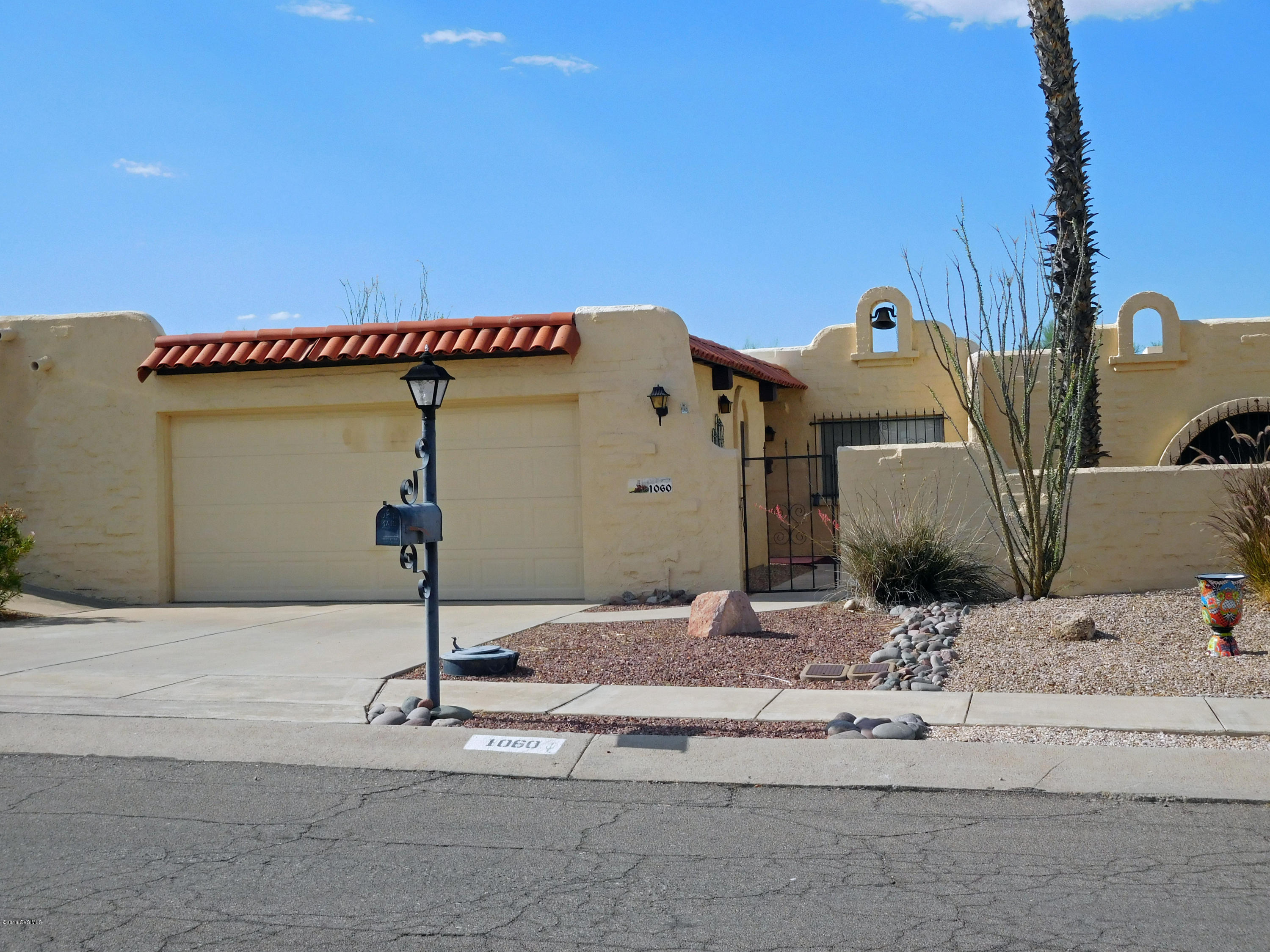Centrally located Townhome within walking distance to Farmer's Market, Walgreens, etc., Owner has taken meticulous care of this home. 2BR/2BA split floorplan. 2 car garage with storage. Nice private patio in the front and enclosed AZ Room that overlooks the park. NO GVR, but is available. Newer HVAC. Owner is very motivated.
