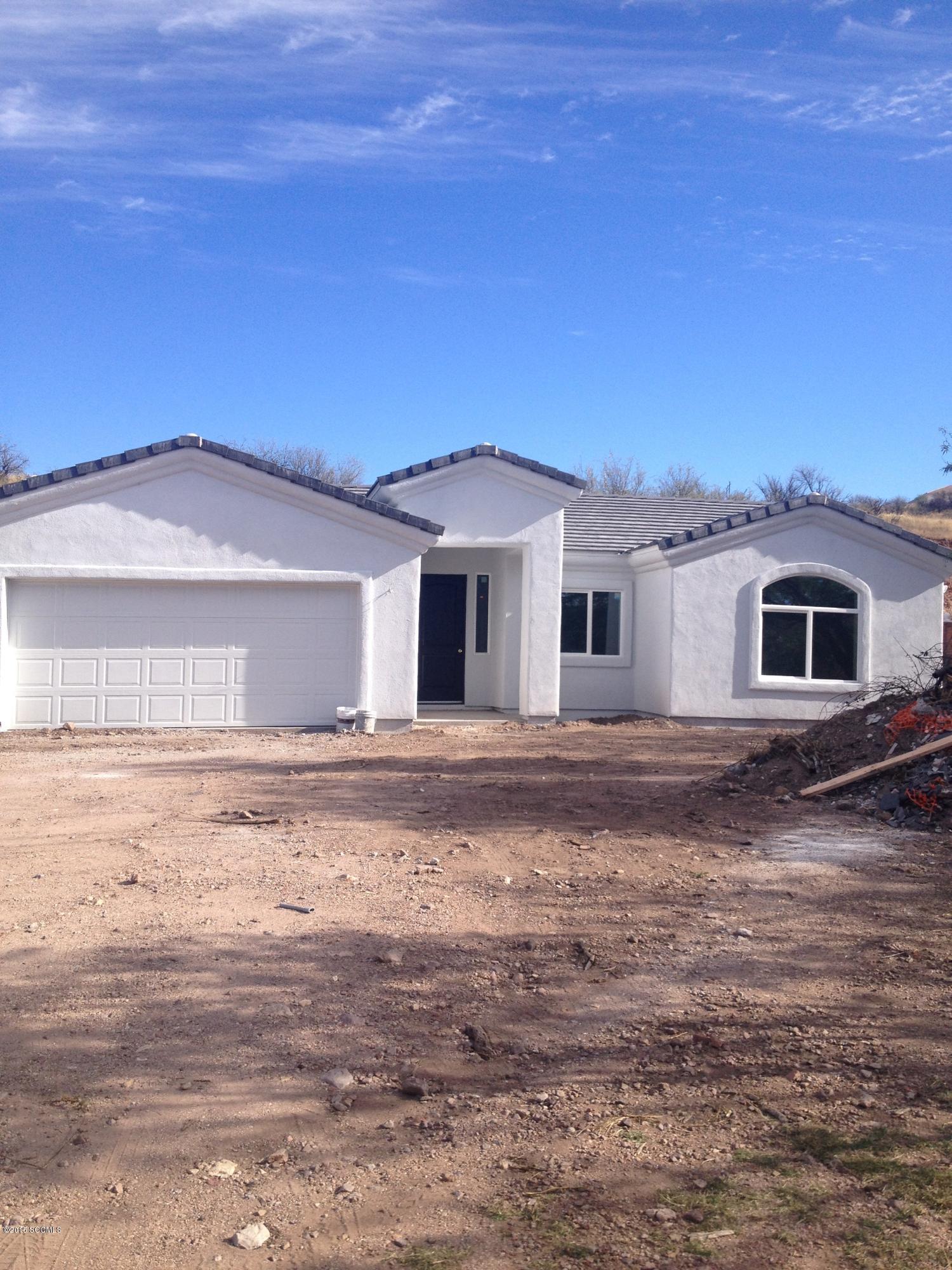 New Construction home with tile roof, vaulted ceilings, granite counter-tops, ceramic tile floors throughout and upgraded fixtures.