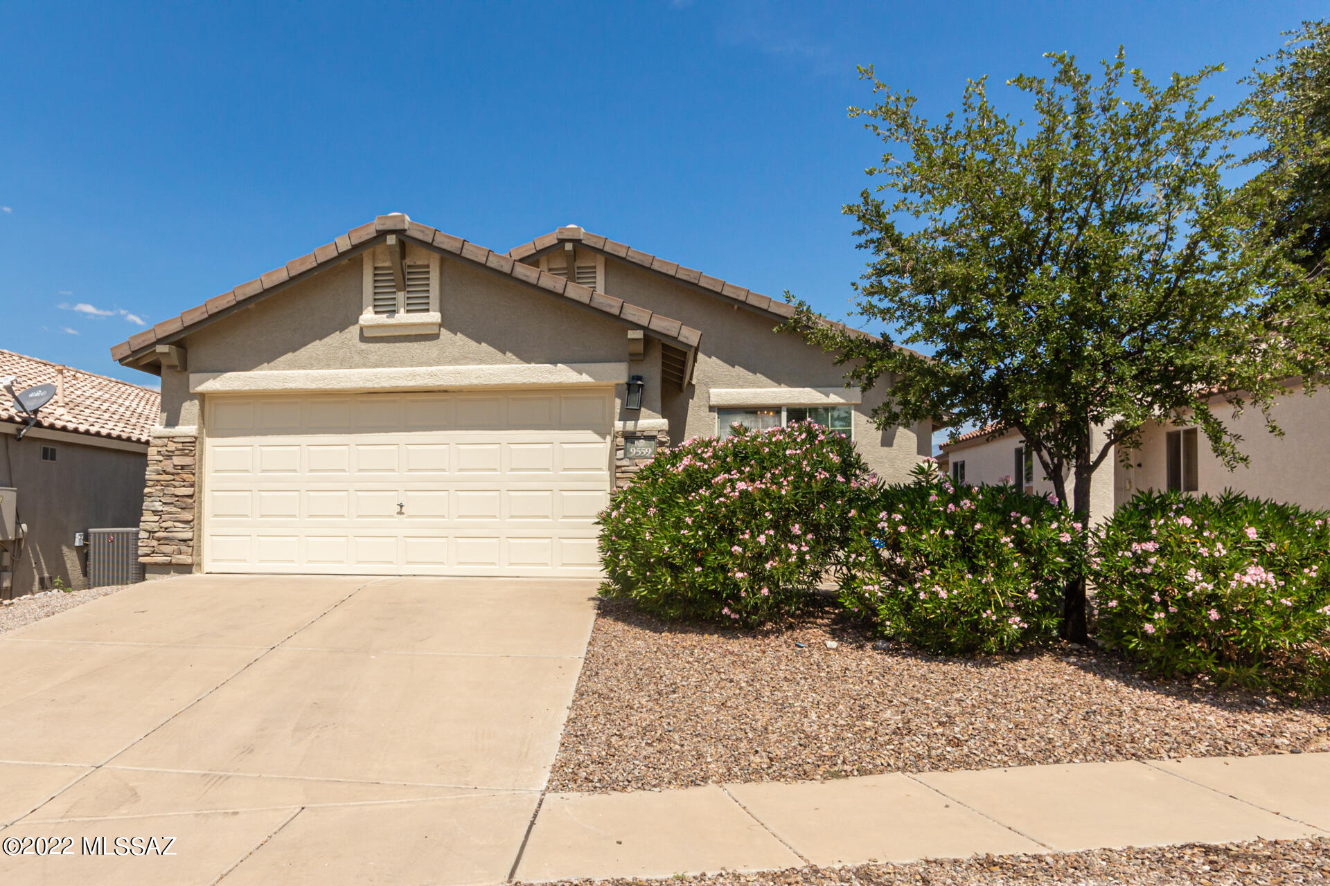 Beautiful Pulte 3bd/2ba home in the lovely Serenata Community. Perfect East side location. Amazing updated Kitchen with large 42'' upper cabinets, sleek Quartz countertops and stainless steel appliances. Durable ceramic tile throughout all the common areas and nice carpet in bedrooms. GORGEOUS Catalina mountain views from the covered patio overlooking the large backyard. High vaulted ceilings and the extra deep two car garage is great for storage. Don't miss your chance to call this one home!