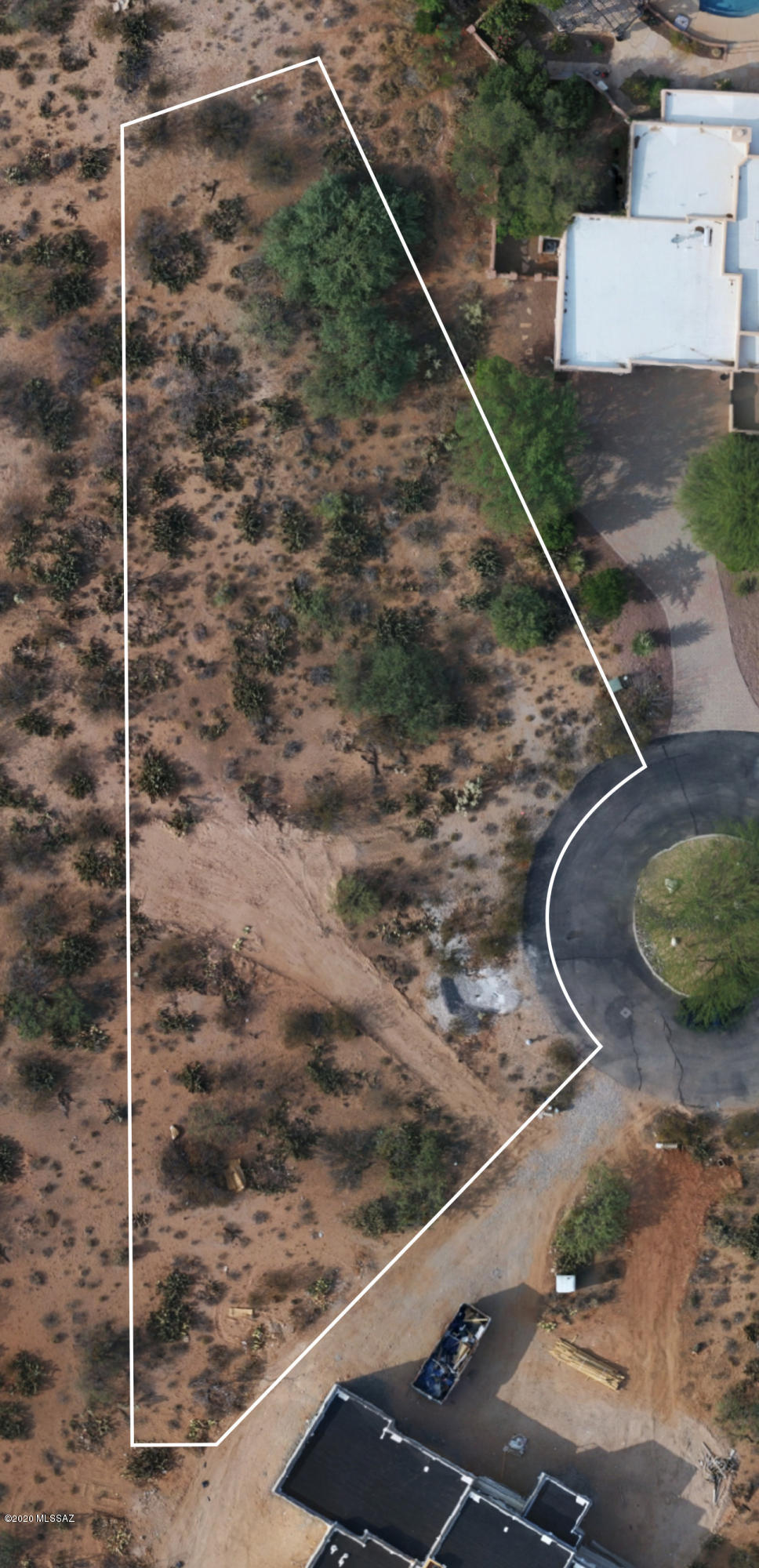 There are only 11 lots left in this well developed and maintained subdivision. The roads are paved and and utilities are available at lot line. This lot is flat for an easy build with wonderful views of the Rincon mountains.  There are three floor plans already approved by HOA for your choosing. Sellers are licensed to sell real estate in AZ.