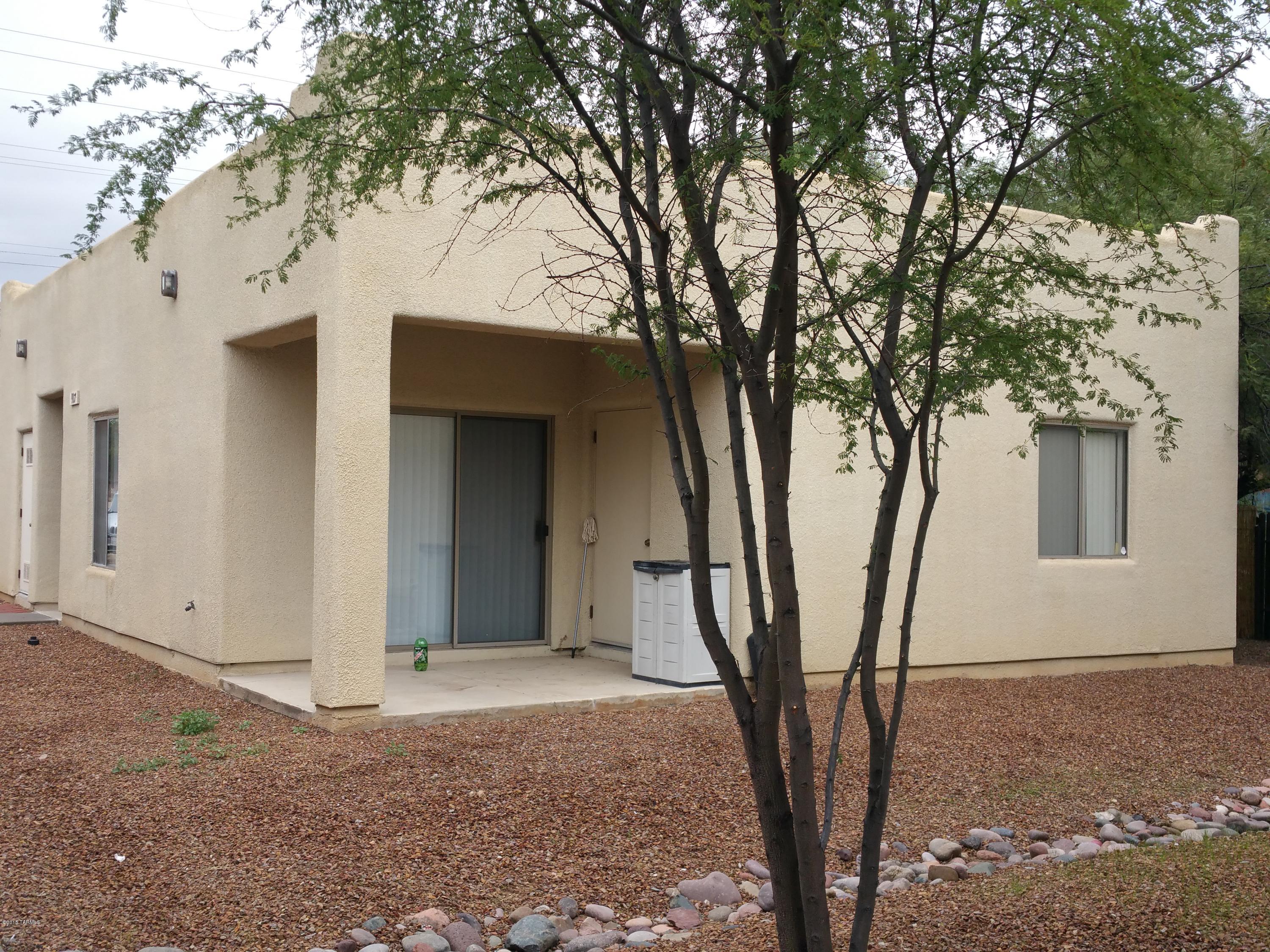 Range pricing-Seller accepts/counters offers $299,000-329,000. Fantastic rental location 1 block from UA Campus. Two 1bd/1ba units front. Separate back house 2bd/2ba. Fully rented. Coin-op laundry for add'l income. Please do not disturb tenants.