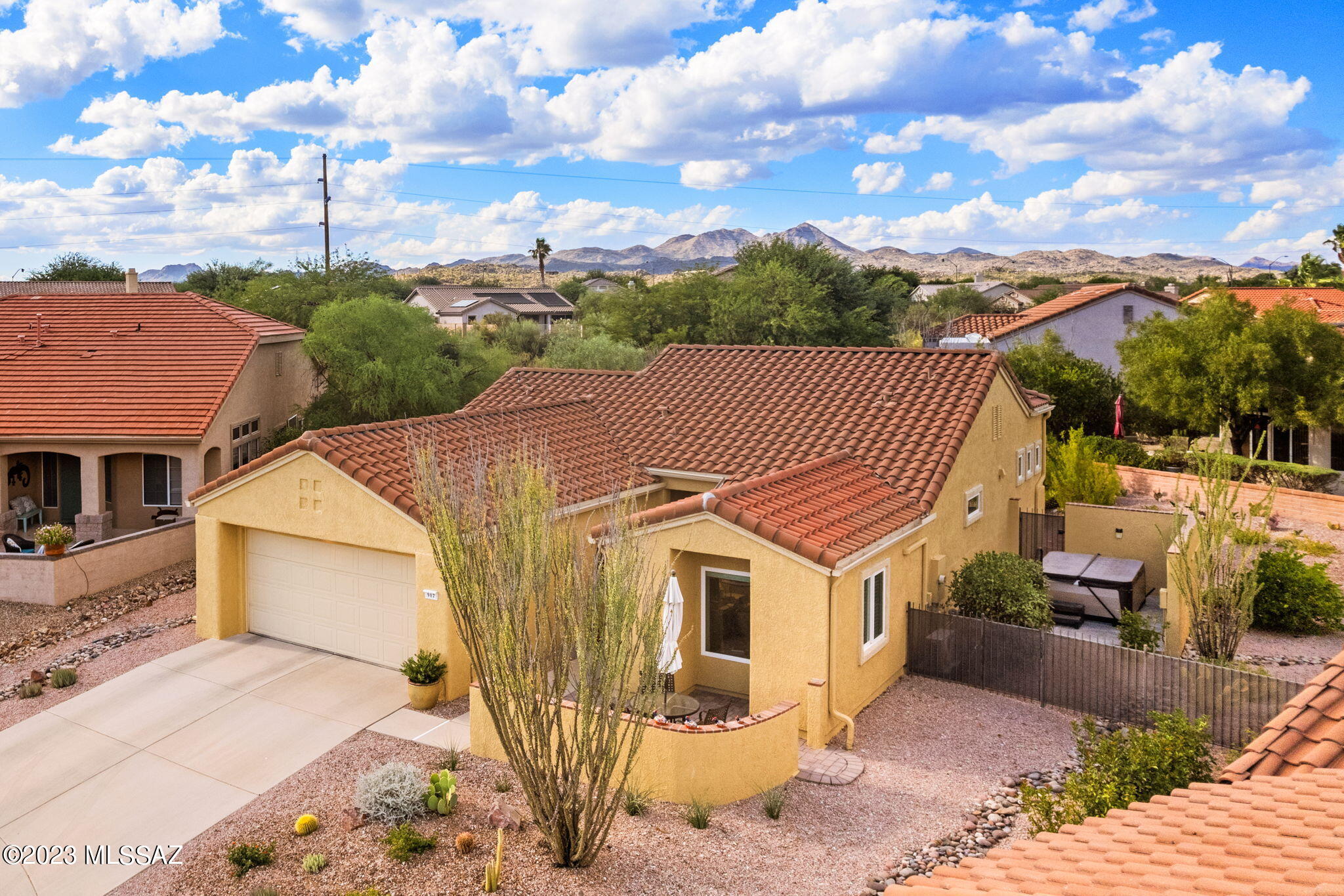 IT'S ALL NEW in this incredibly charming ($100K+) remodel. Kitchen impeccably redone w/ tasteful alder cabinets, Quartz & GE Café appliances. Wall removed between living room/kitchen to create open concept feel. NEW HVAC, roof, Milgard windows, doors, baths & water heater - all replaced! Tile everywhere (no carpet). Guest room expanded by DOUBLING ITS SIZE to create new office/den area w/ 3 closets! New paint in-and-out & private/enclosed hot tub w/ Catalina view outside. Professional landscaping w/custom pergola, brick patio, beautiful Desert Acacia, Pistachio, fig & lime trees & flowering plants, creating shady, private/serene sanctuary that invites beautiful birds to stop by for a visit while you're immersed in your favorite new novel. It's perfect-bring a suitcase and move right in.