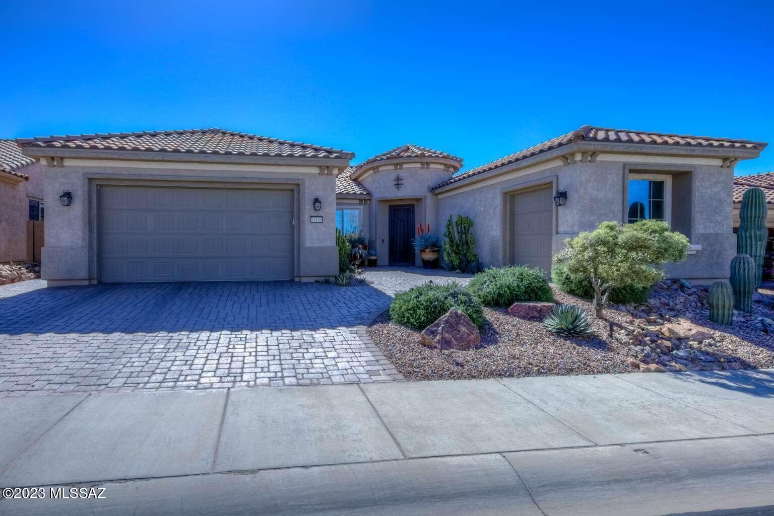 Take advantage of this rare opportunity to make this charming Del Webb Serenity home yours. The home, with over 2300 square feet is professionally landscaped, built with over $200,000 in upgrades. The spacious open floor plan, with 10ft ceilings, all tile floors, with upgraded bow windows in the dining room and primary bedroom, is move-in ready. 
       Well-maintained and bright, it is designed with a tasteful modern palette, neutral colors, a den/office and two large primary suite retreats.  The gourmet kitchen is well-appointed with upgraded cabinetry (with pullouts) and SS appliances, including a custom oak hood and double ovens. Contemporary fixtures, upgraded LED lighting and modern, state-of-the-art chandeliers offer the designer's touch. Featured is the custom-installed Home Theater in the Great Room consisting of Kef in-wall speakers and Denon electronics. The home is equipped with a Kinetico water system that includes soft water, carbon filtered and reverse osmosis. Also included is an upgraded, newer HVAC 5-ton A/C with electronic air filtration.  All bathrooms, including the powder room, are beautifully appointed with tile surrounds, sleek new mirrors and designer lighting. The walk-in pantry and closets boast custom shelving and drawers.  Also included are Plantation shutters, blinds and drapery panels. The 16ft sliding door opens to a gorgeous covered paver patio with a touch-of-a-switch gas log fireplace for cozy outdoor nights.
      The back and front yards are professionally landscaped, irrigated and with low voltage landscape lighting needing very low maintenance. An added bonus is the extended garage with length and width extensions, plus a cart garage with epoxy  floors.  Front  and side  garage  steel security doors are an added bonus. In addition, there are custom storage cabinets in both garages, including two-240 amp outlets for your electric car and golf cart!   Adjacent to the garage is a separate air-conditioned storage/hobby room 10' x 10 with steel.. All appliances, including the pedestaled washer/dryer are included, making this a Lock 'n Leave or Stay-Full-Time home in this beautiful and friendly Del Webb community that includes a fabulous pool, health club, structured activities and outside sports complex.