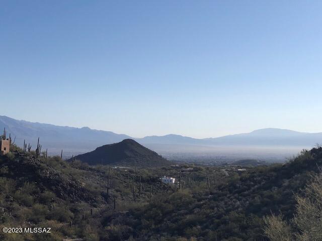 3.4 acres of PEACE, SOLITUDE, LUSH VEGETATION and MAGNIFICENT VIEWS of SURROUNDING MOUNTAINS and DISTANT CITY LIGHTS.  This is the kind of desert you move to Tucson for ! ''End of the Road'' BEAUTY, minutes past the Cmo Del Cerro TRAILHEAD for unlimied HIKING, ,RIDING.and BIKING in SAGUARO NATL PARK WEST. Electric and phone,, buyer to drill. Many wells in this area(see Well map in attached Documents). Wonderful RURAL FEEL yet a short drive to I-10, DOWNTOWN , U of A, St. Mary's Hospital, etc. Easy to walk, show and FALL IN LOVE.
