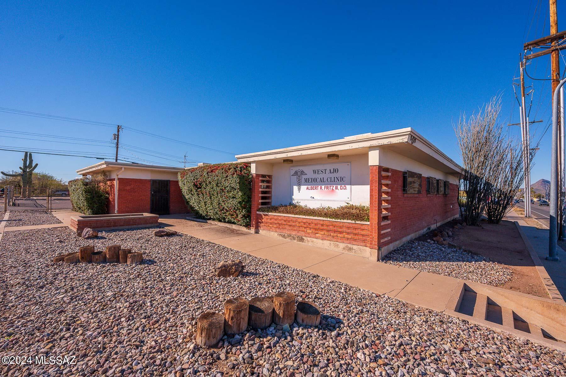 Sale included 101 W Ajo Way and 3826 S. 7th Ave. Lot Square footage , legal and tax information is the combination of these two properties. Great business opportunity with this stand-alone office building located on a corner lot, only one block away from Tucson's Veteran's Administration Hospital. The building features multiple exam rooms, a reception area, storage room and office space. A dedicated parking lot behind the building is surrounded by chain-link fencing. This property is offered in conjunction with the vacant R-3 zoned lot behind it located at 3826 S. 7th Ave (MLS# 22403064) for the combined purchase price of $280,000.
