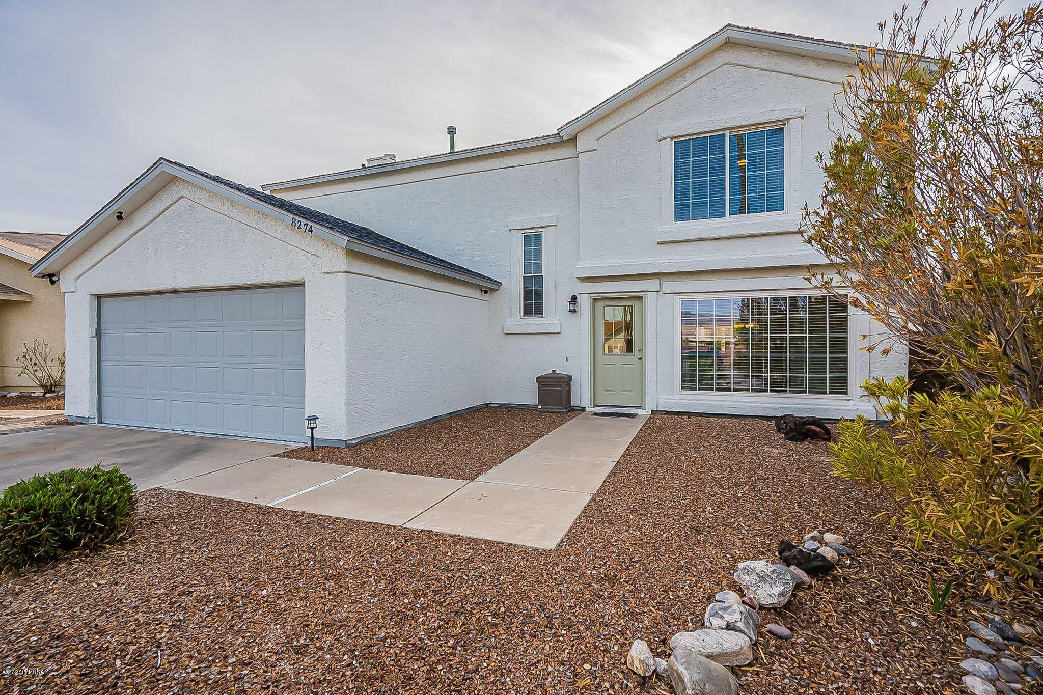 Honey stop the car! Gorgeous remodeled 2-story contemporary home with sparkling pool. This beauty is situated on an over-sized private premium lot. Newer stainless steel side by side refrigerator w/ice maker included. NO POLY PIPES! This home also includes security cameras, package delivery box and motion sensor security lights. Relax under 2 covered patios, adore the lush mature green vegetation, soothing fireplace in family room, bonus room with built in cabinets, walk in closet, large master suite with chic upgraded bathroom fixtures, modern plank flooring, garage epoxy floor, storage shed with landscaping tools, newer water heater, exterior paint, and so much more! You have to see to believe it! Watch the video.