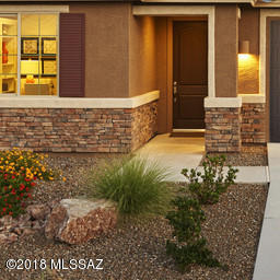 This new home greets guests with an elegant stone veneer and covered porch entry. The main floor boasts a quiet study with french doors and an adjacent half-bath. On the first floor you'll also find an open-concept gourmet kitchen,great room and morning room. The kitchen comes complete with stainless steel appliances, chrome pendant lighting over the large island and beautiful light-colored quartz countertops. Upstairs enjoy a convenient laundry room, spacious loft, luxurious master suite with a deluxe bath featuring  dual sinks and a huge walk-in shower with rain showerhead. Additional bedrooms are also upstairs. This home is a must-see! Pricing shown is with use of builder lender and insurance company.