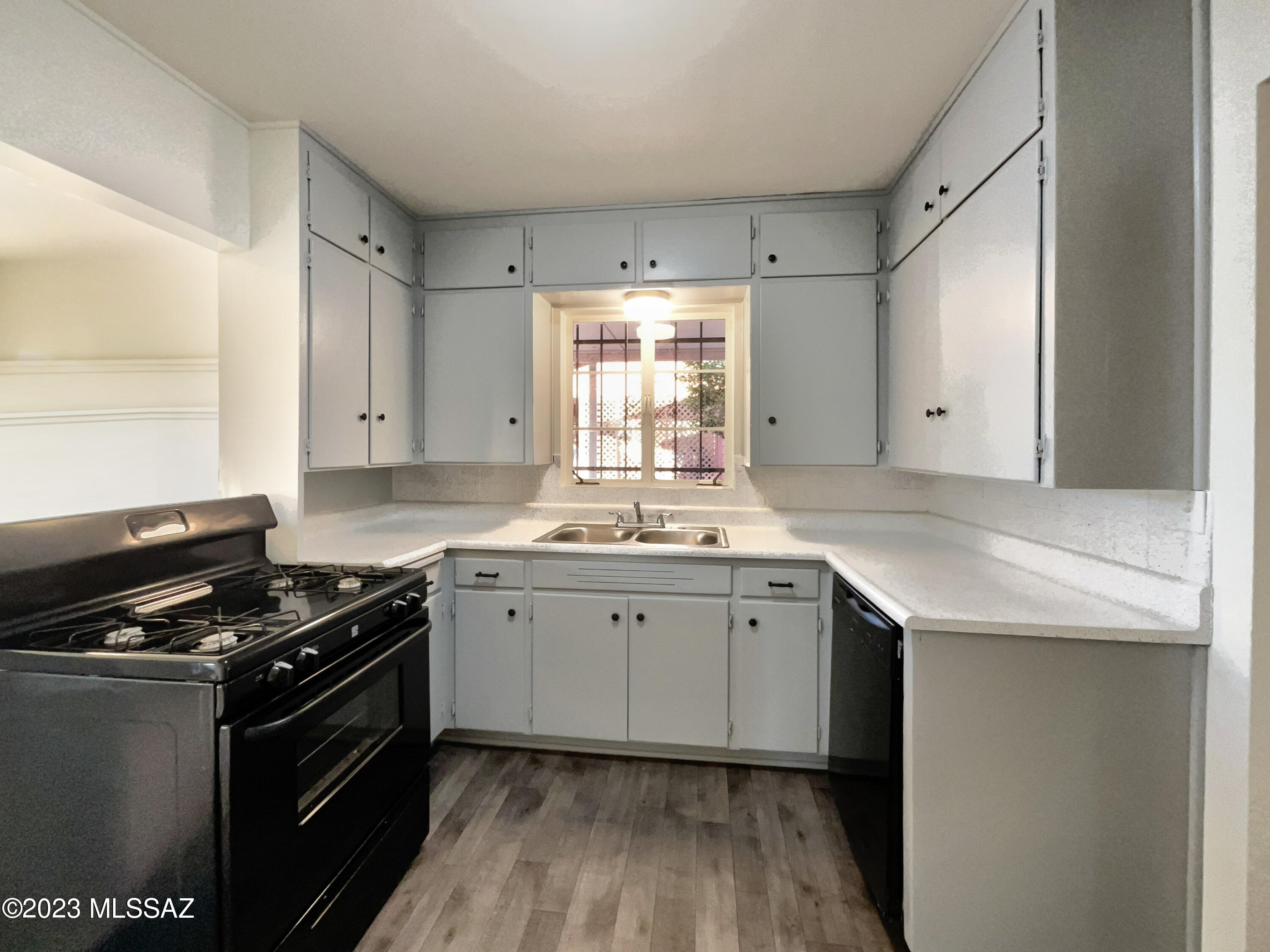 Freshened up and ready!  This home has fresh interior paint. Windows create a light filled interior with well placed neutral accents. Step into the kitchen, complete with an eye catching stylish backsplash. Head to the spacious primary suite with good layout and closet included. Additional bedrooms provide nice living or office space. The primary bathroom features plenty of under sink storage waiting for your home organization needs. Take it easy in the fenced in back yard. The sitting area makes it great for BBQs! A must see!