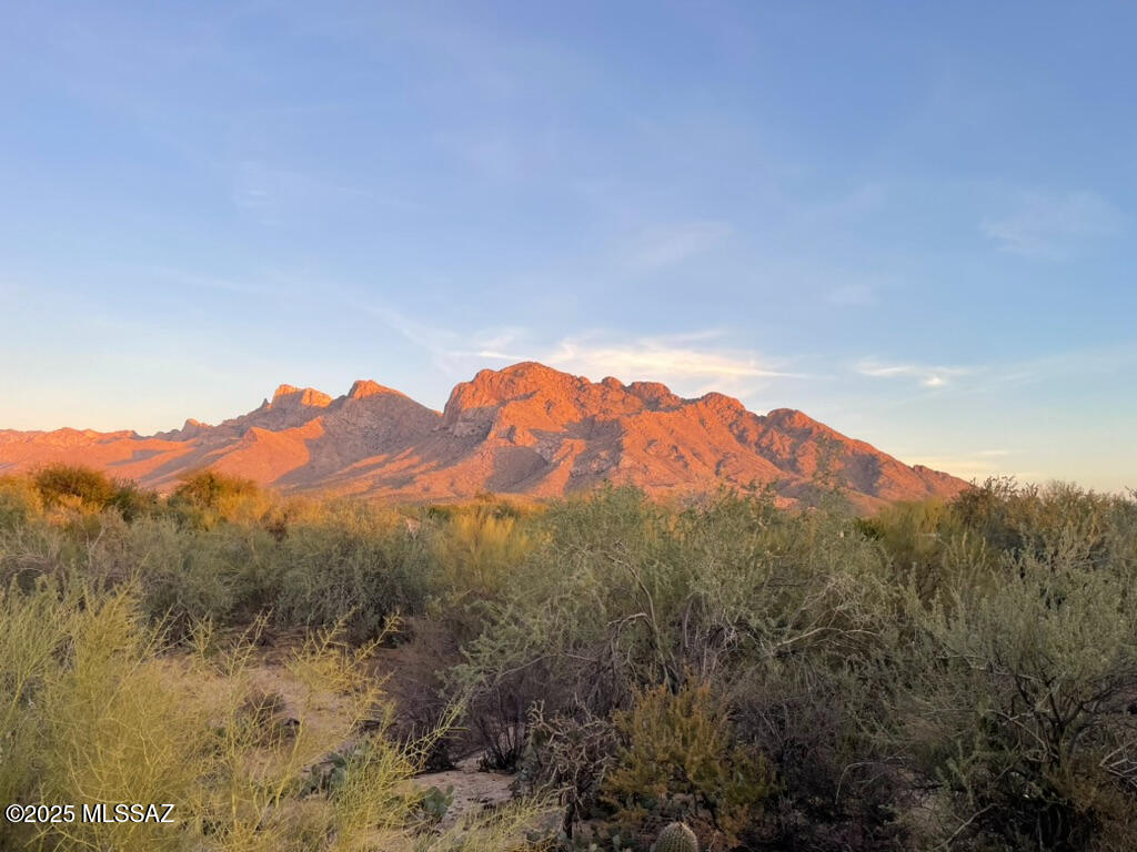 Amazing 1.07 acre Lot with Priceless View of Pusch Ridge. One of the few remaining lots in Oro Valley Estates. We are planning to build our ''forever home'' on this perfect lot but need to consider selling the lot due to some unforeseen circumstances.